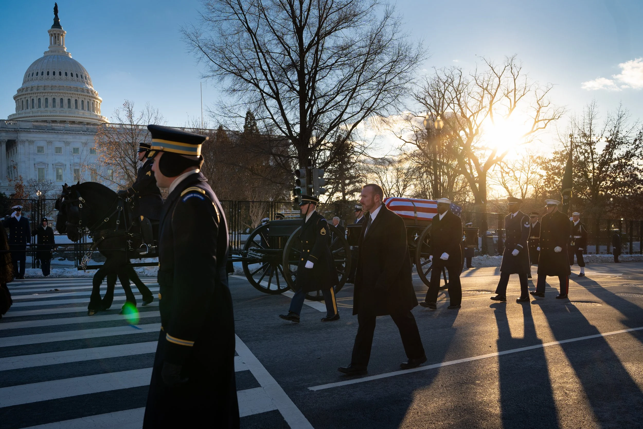 The funeral procession for former President Jimmy Carter passes the U.S. Capitol in Washington, Tuesday, Jan. 7, 2025, as his casket is brought to lie in state.