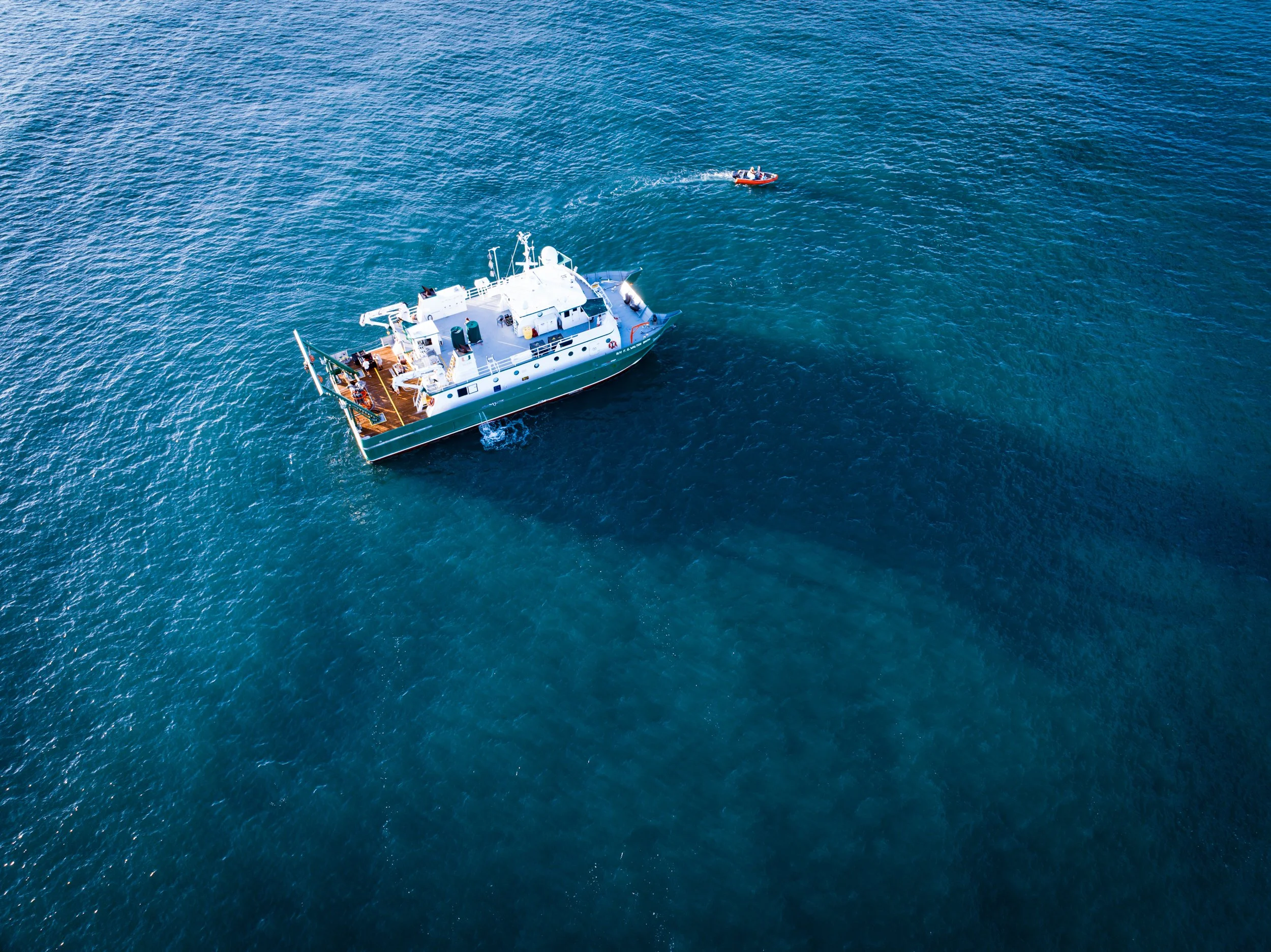 A dive boat carries scientists to a research site as data collection continues offshore on the morning of September 4, 2025.