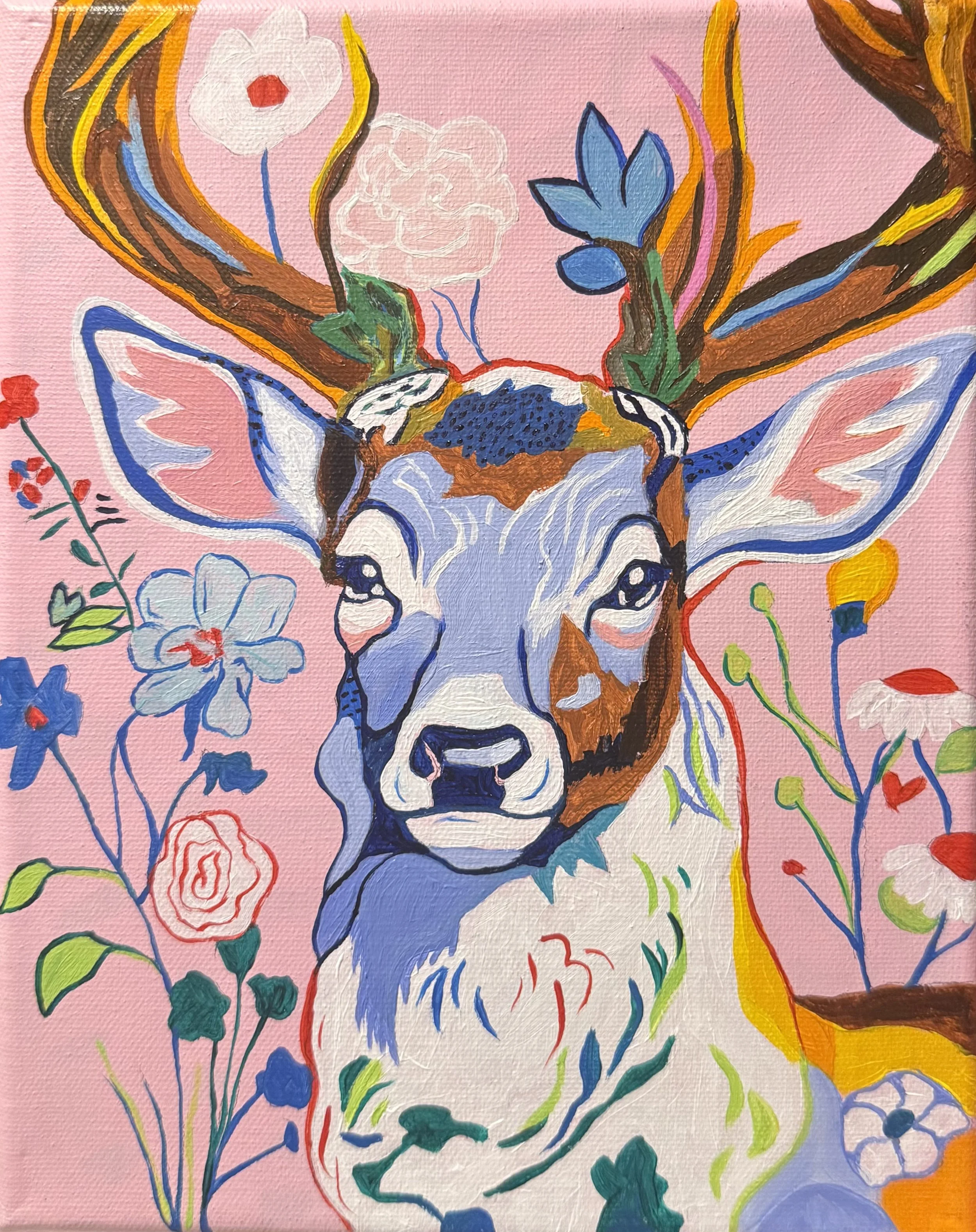Colorful painting of a deer's face with large antlers adorned with flowers and leaves, set against a pink background with various colorful flowers.