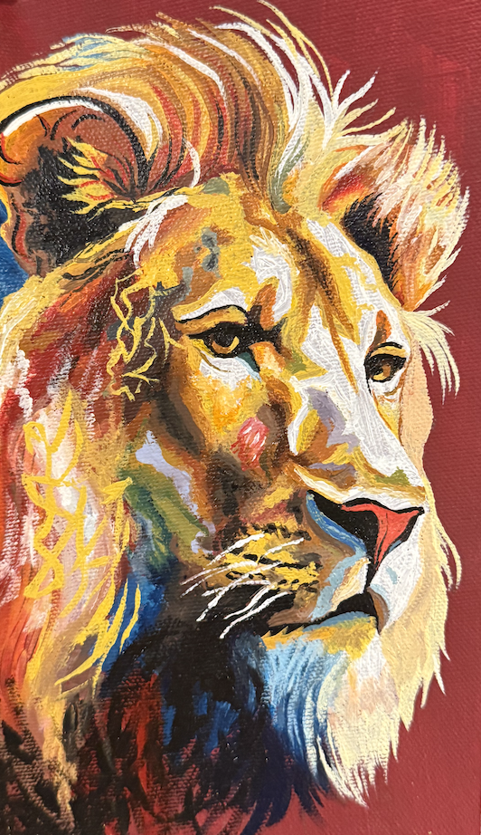 Colorful abstract painting of a lion's face on a red background.