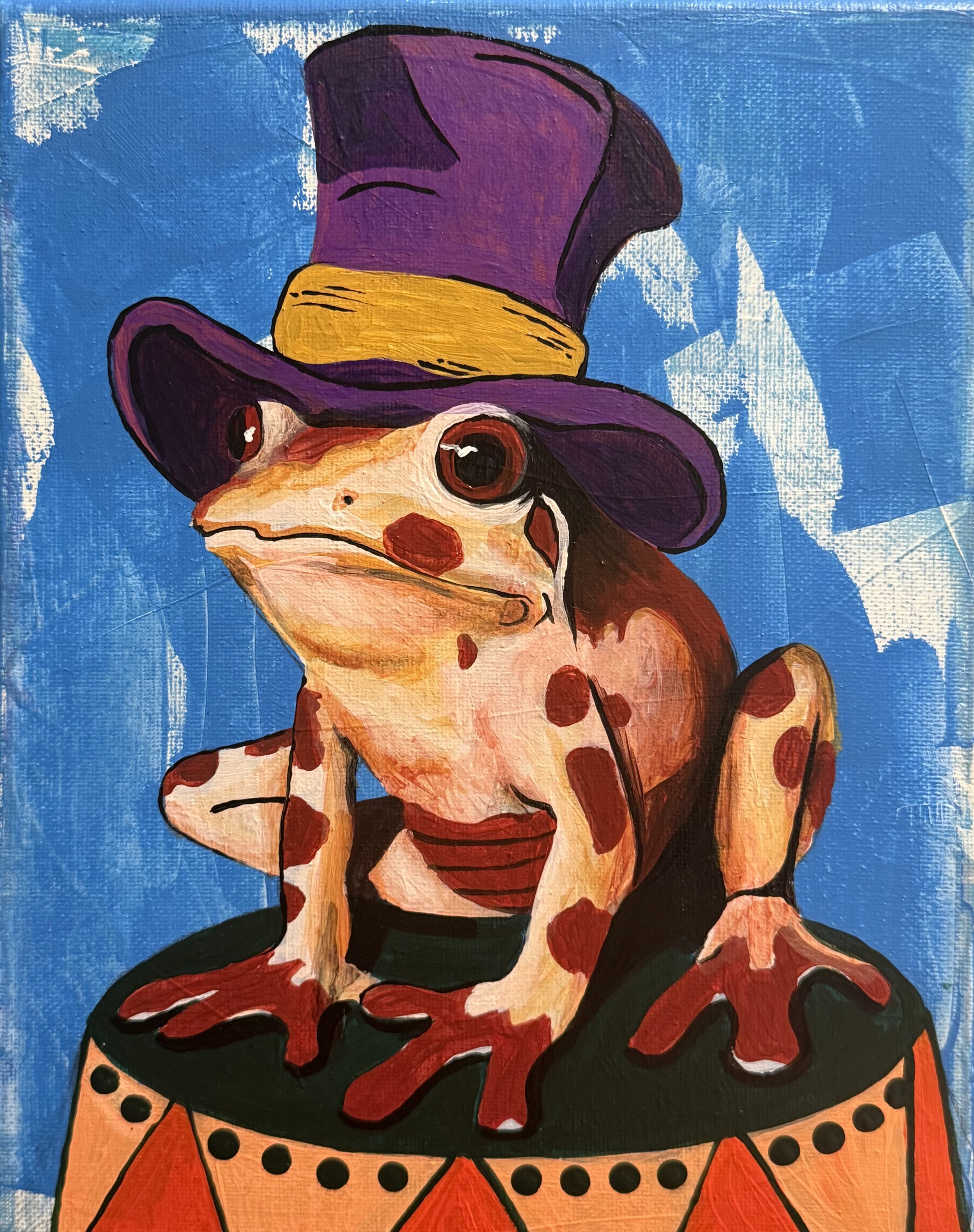 A colorful painting of a frog dressed as a clown, wearing a large purple top hat with a yellow band and a black shirt. The frog is sitting on a decorated platform against a blue background.