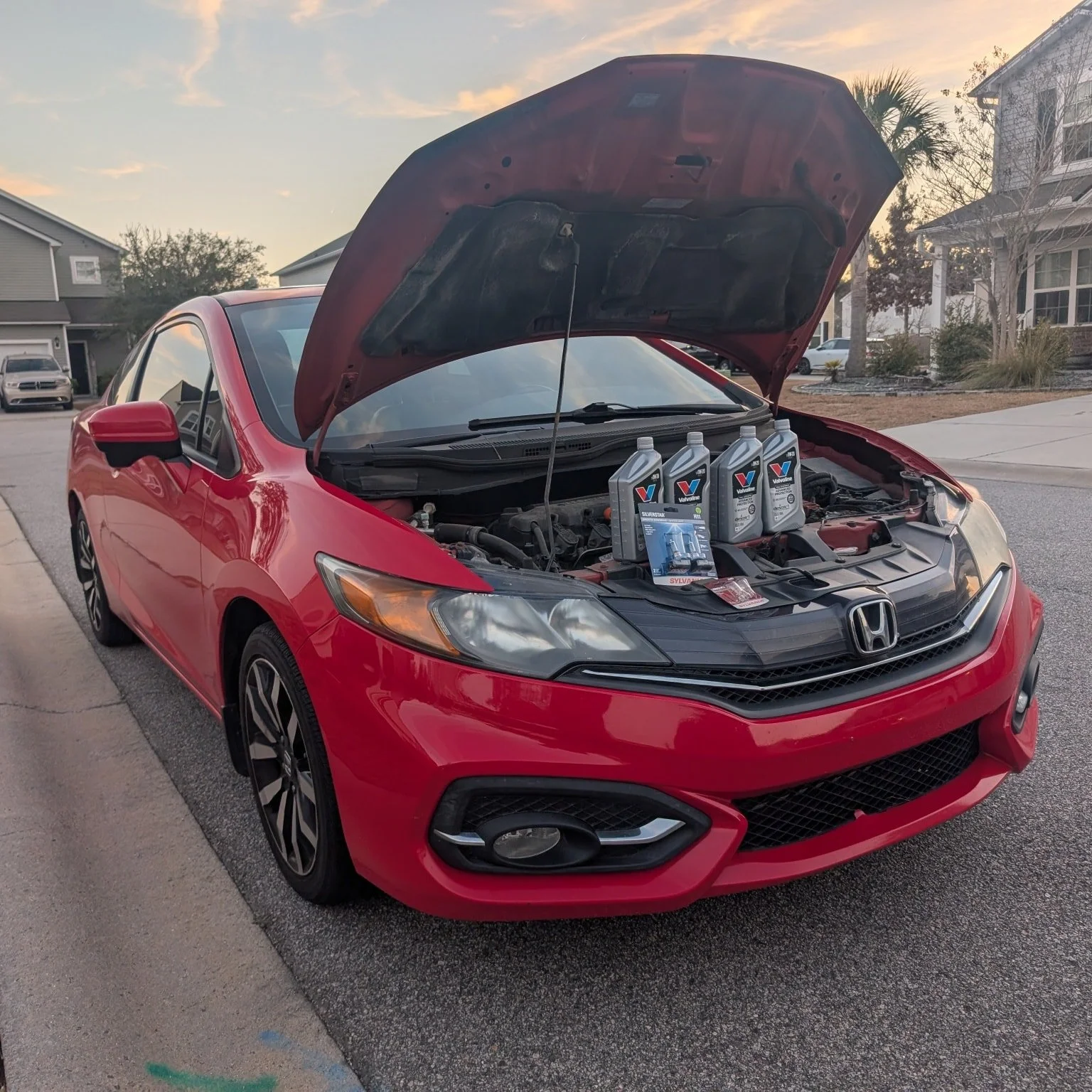 This customer was due an oil change and wasn't home to care for his car. We took care of it and replaced the head lights and brake lights.