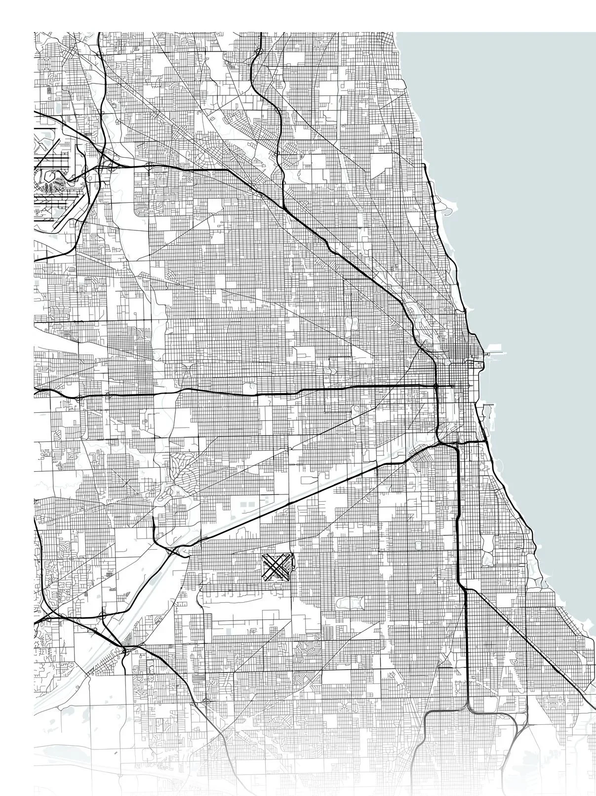 Black and white map of a city with a grid street pattern and major roads highlighted in black, shoreline visible on the right side.