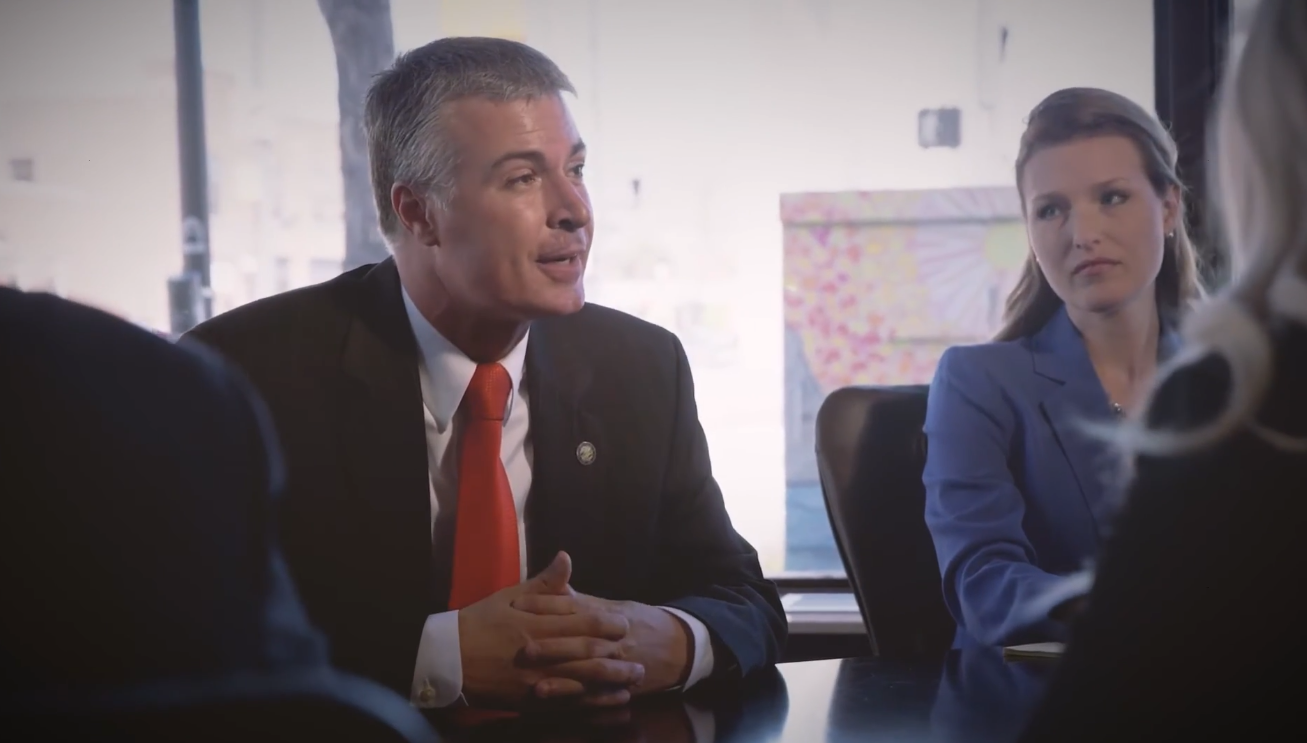 Marty Jackley and Sara Frankenstein in GPNA Law firm office