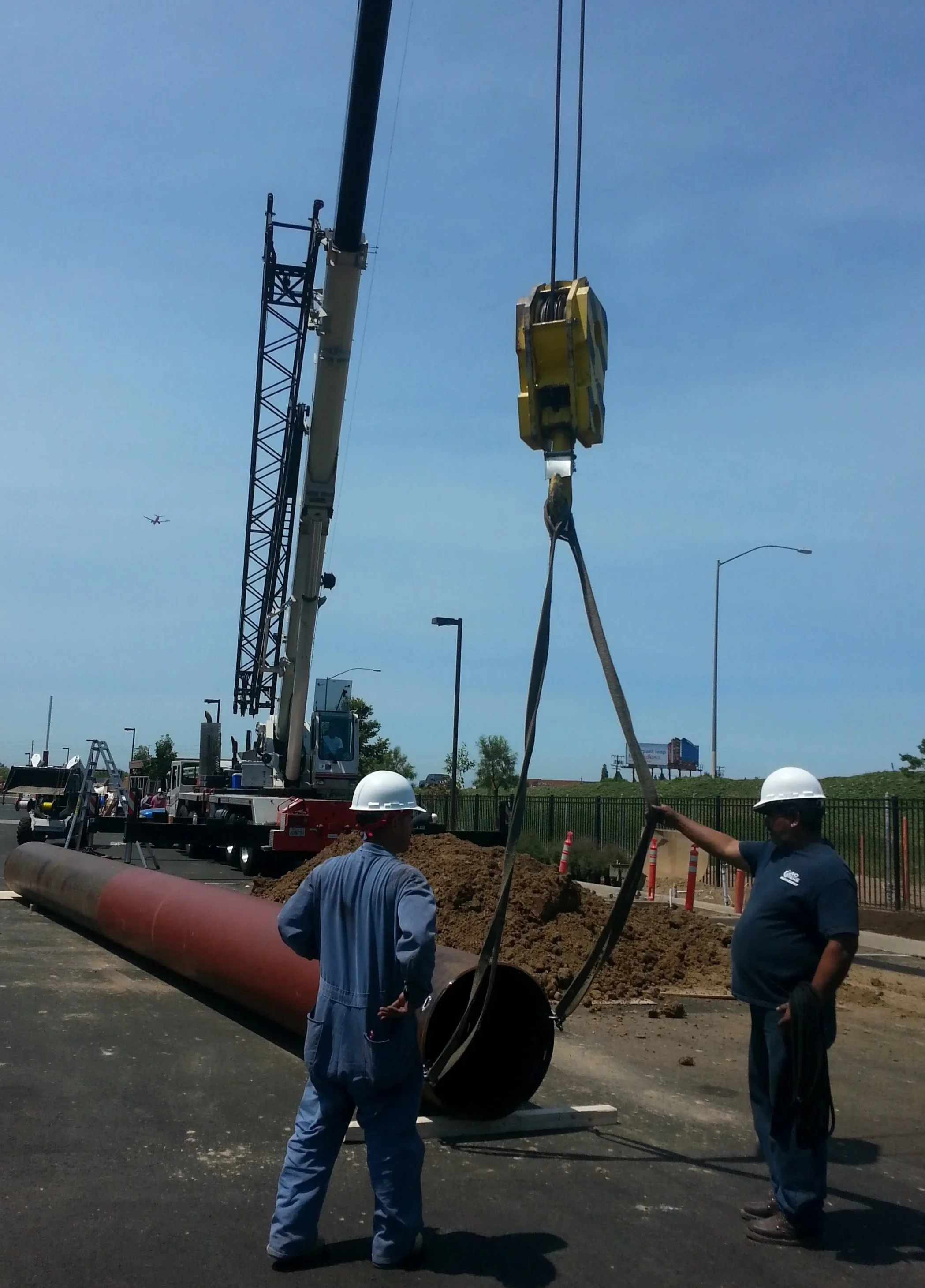 installation of base pole for a new pylon sign in orange county california