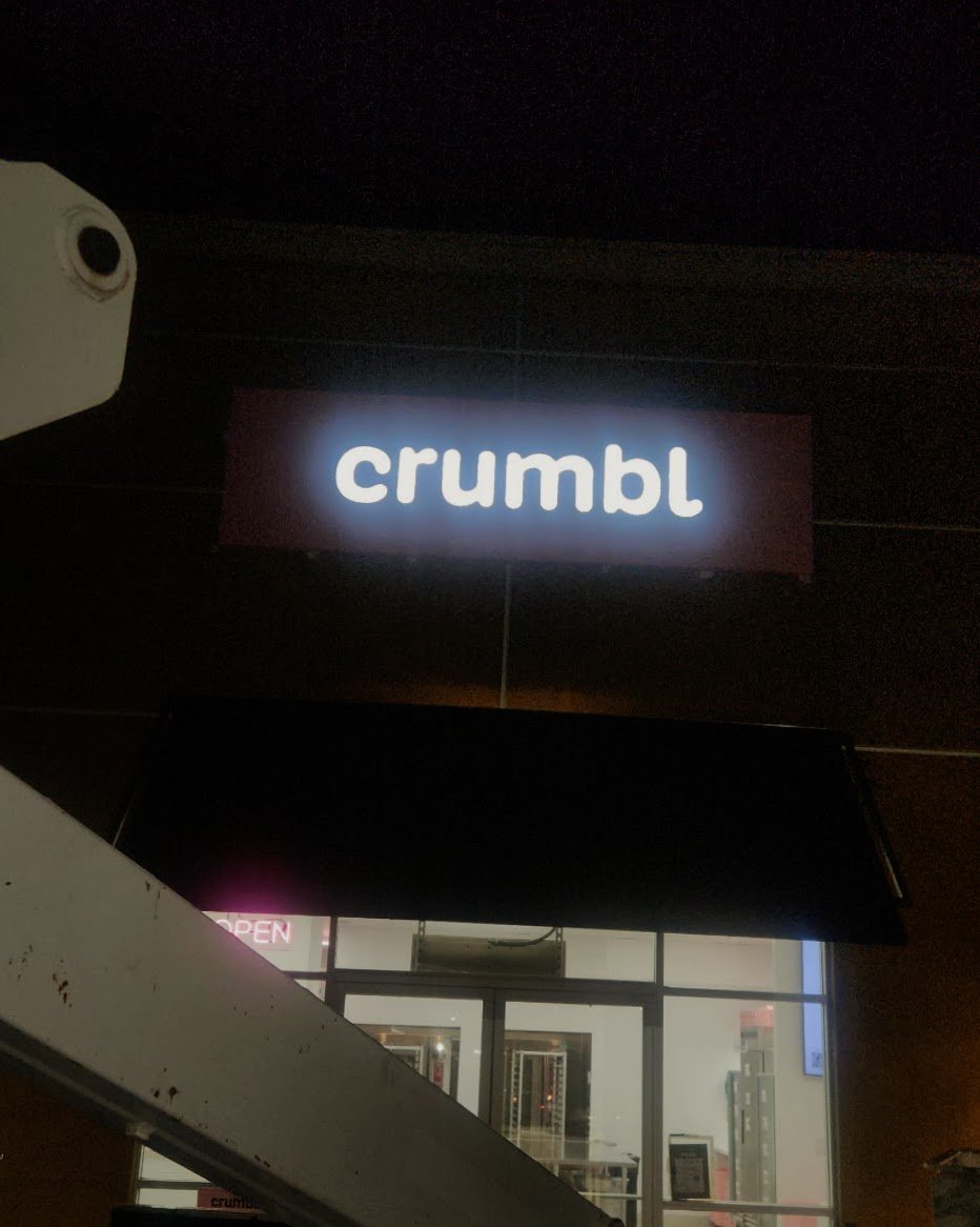 Channel letter sign on a retail space night illuminated near Los Angeles, Ca.