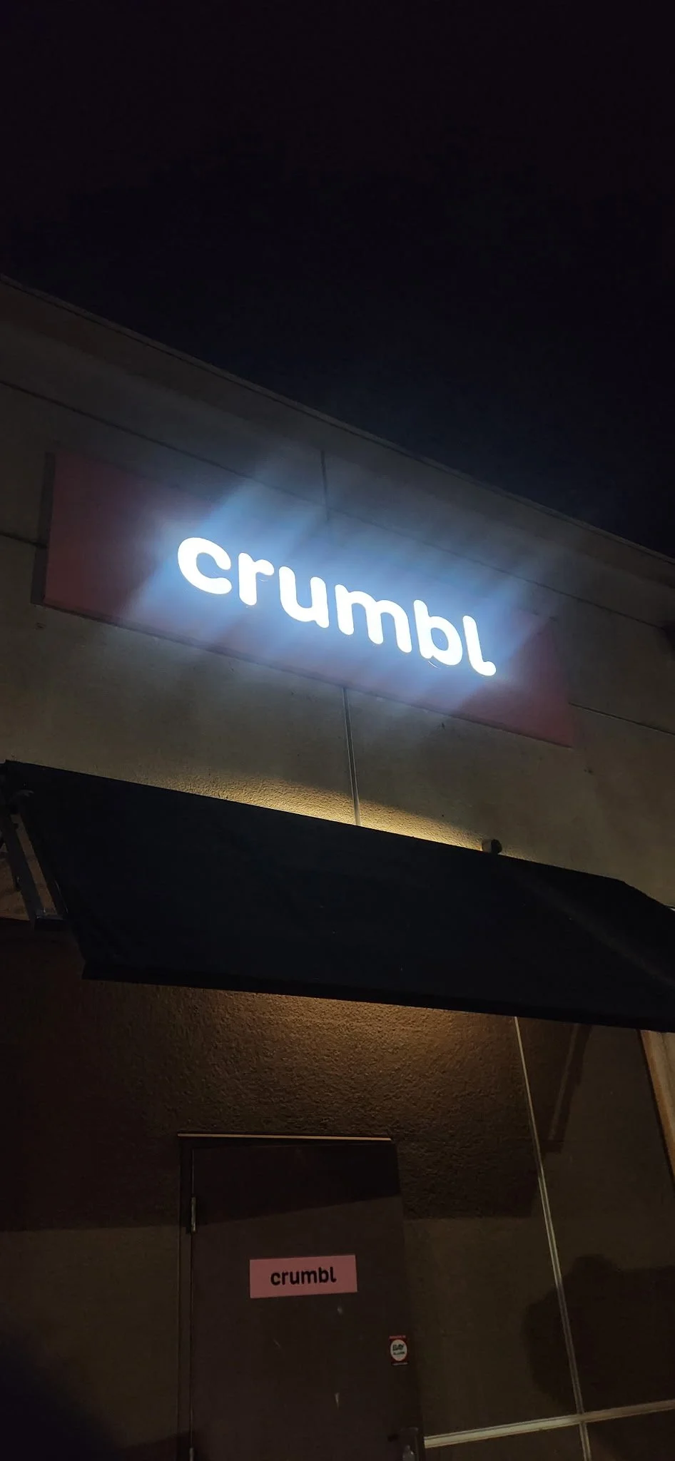 Channel letter sign on a restaurant/retail space night illuminated near Los Angeles, Ca.