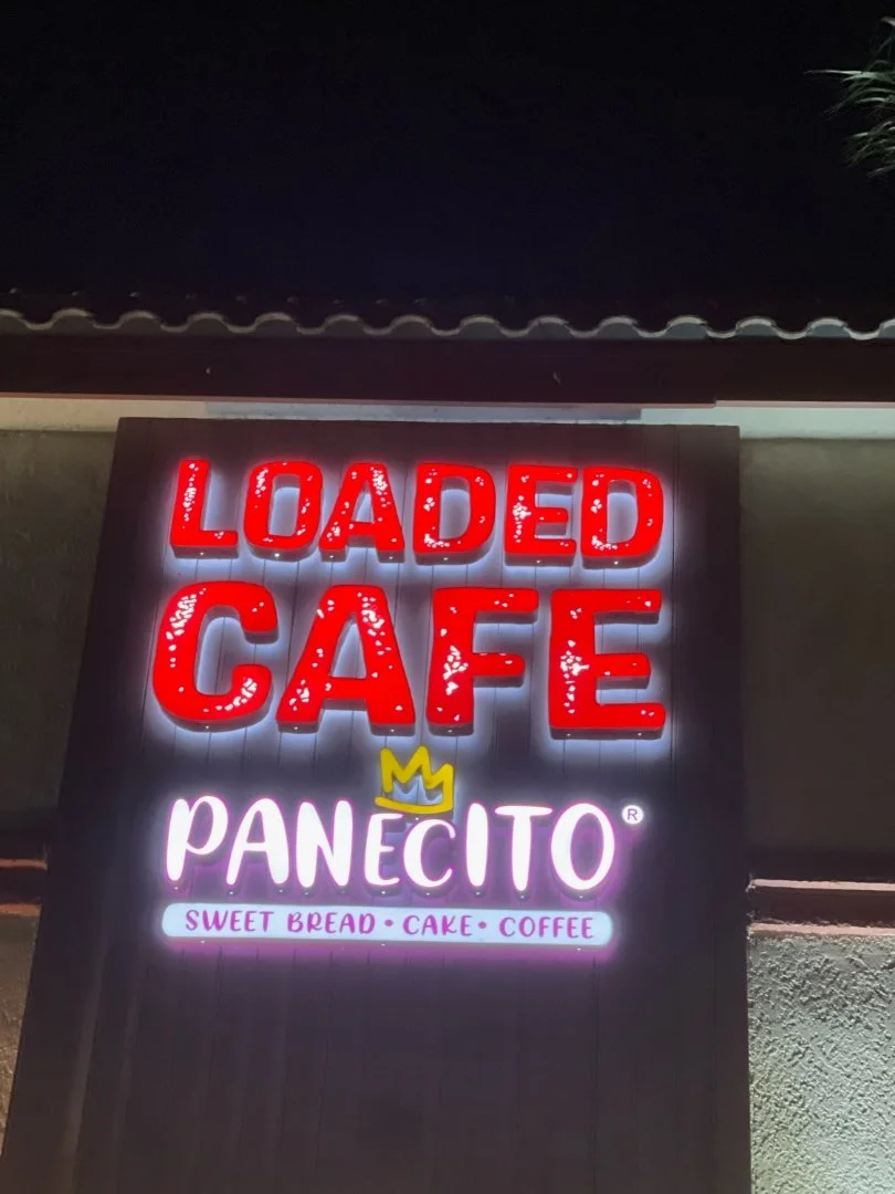 Channel letter sign on a restaurant/retail space night illuminated near Los Angeles, Ca.