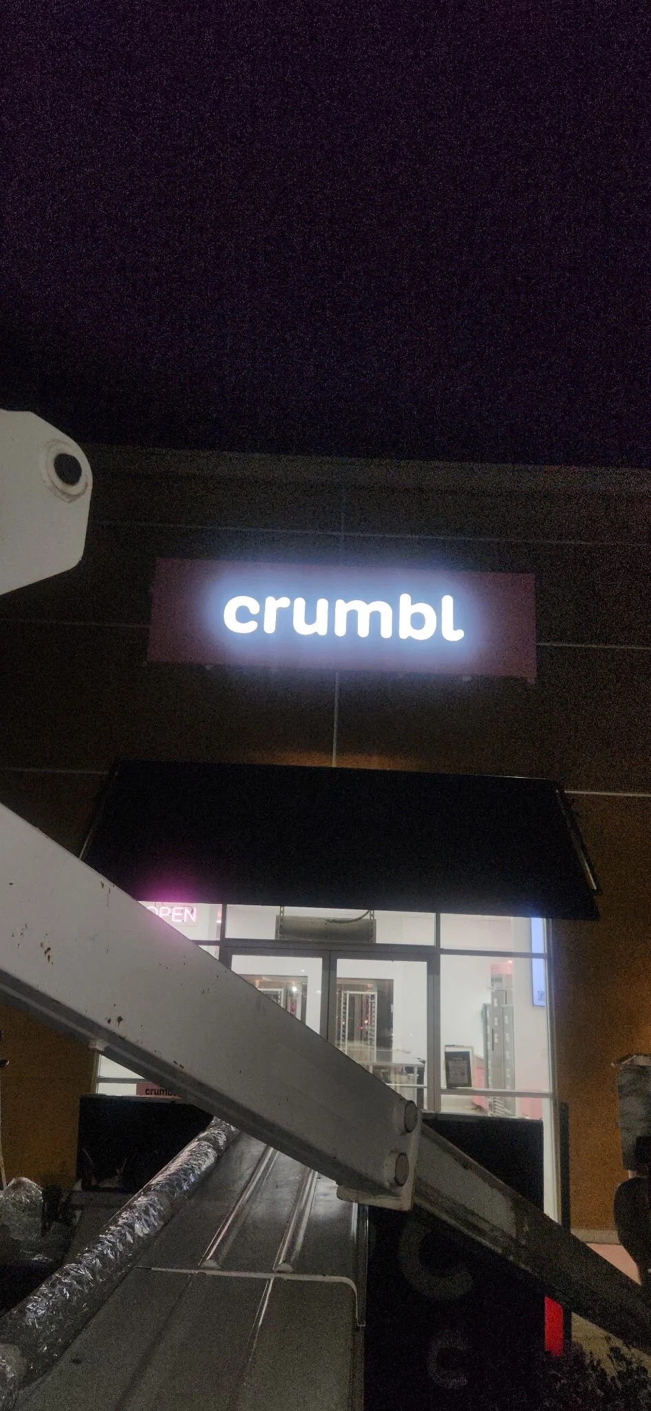 Channel letter sign on a retail space night illuminated near Los Angeles, Ca.