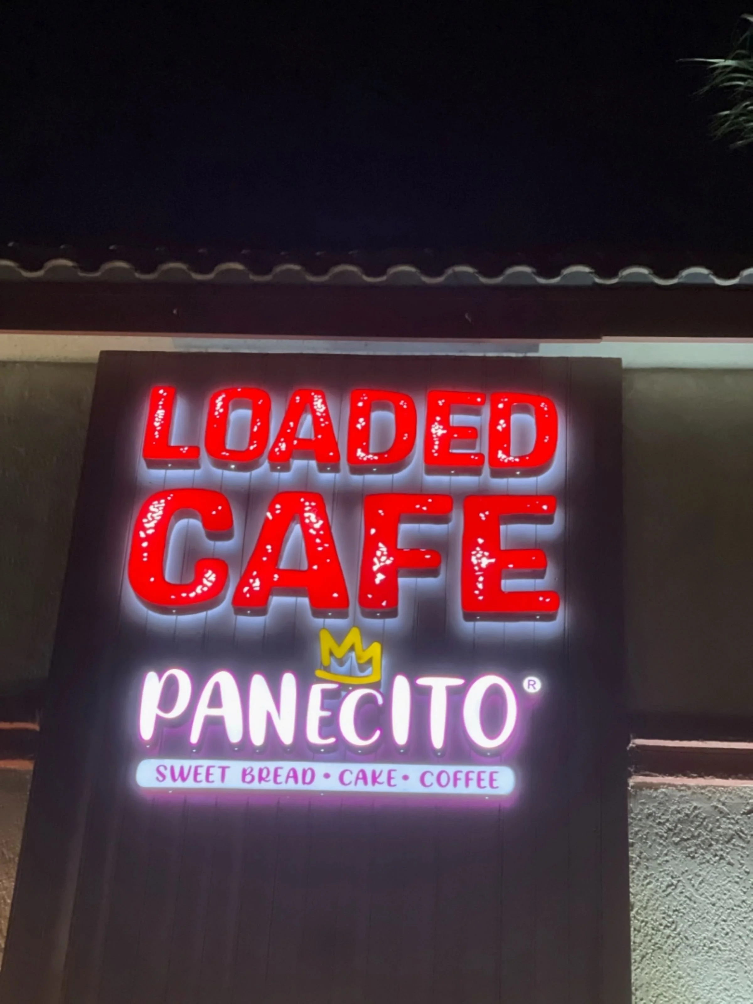 Channel letter sign on a retail space night illuminated near Los Angeles, Ca.