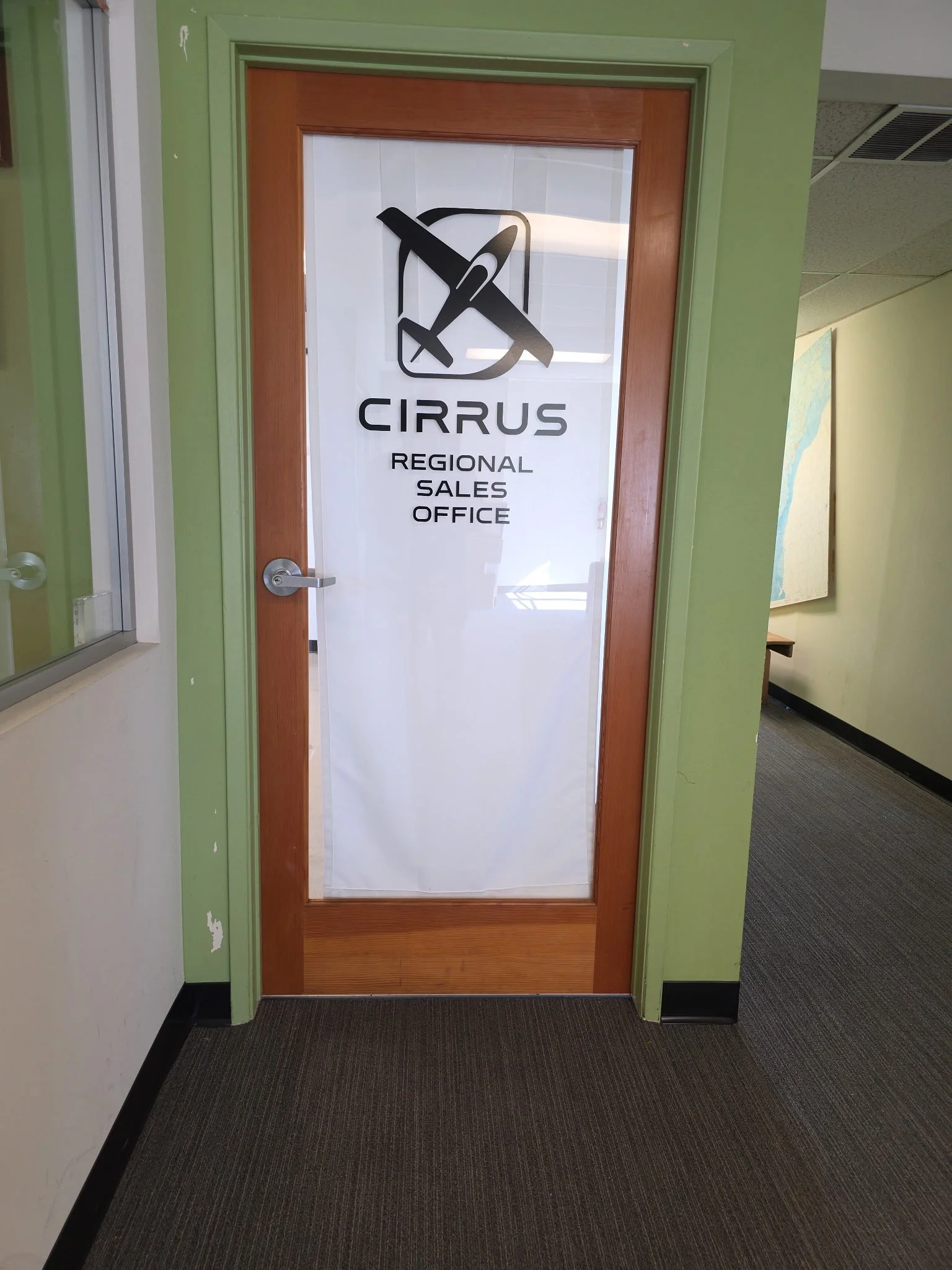 corporate branding sign on door. vinyl installed in santa monica, ca,