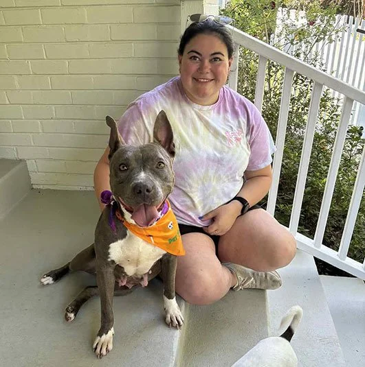 Foster with Dog sitting together