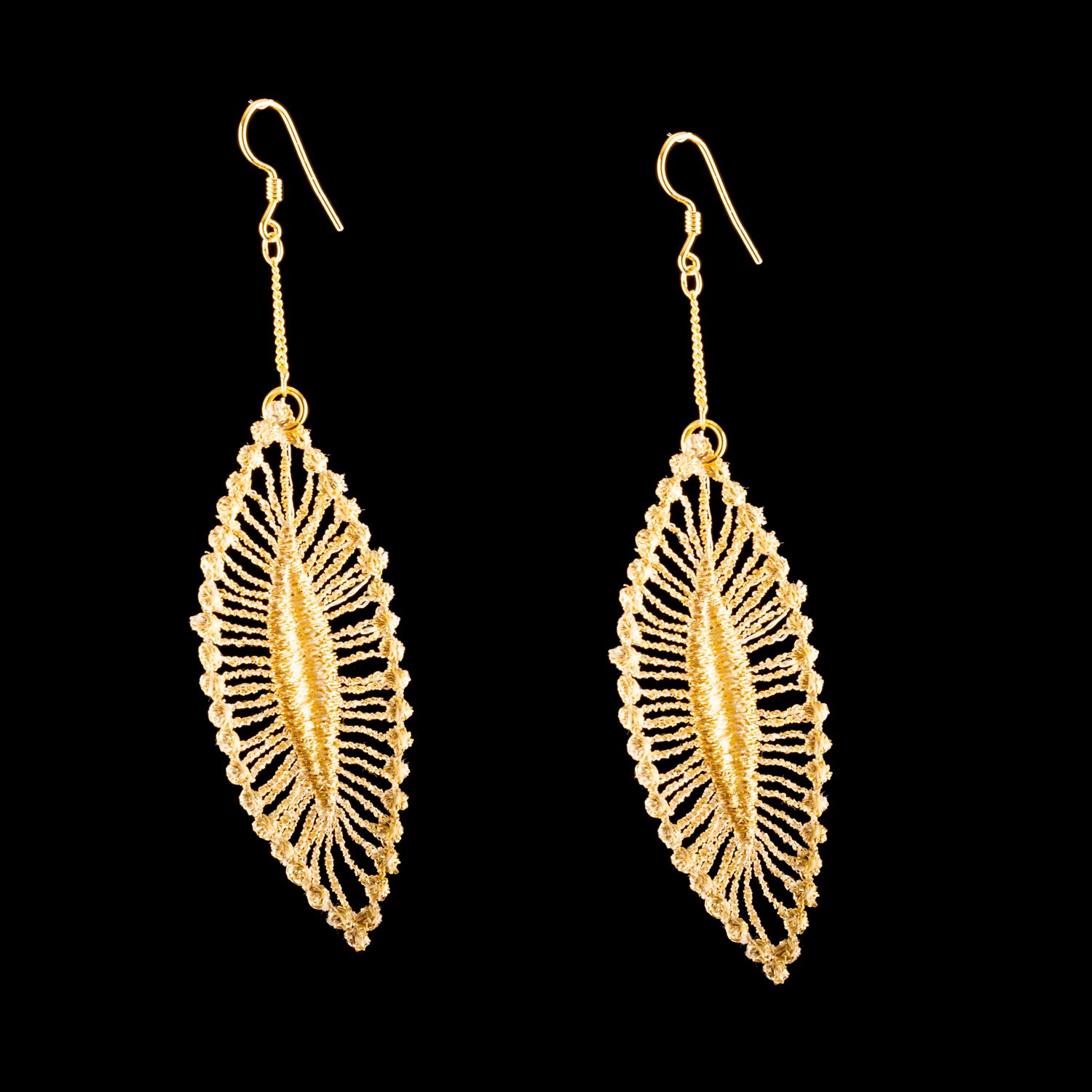 Gold Shiny Leaves Earrings by Paz Sintes