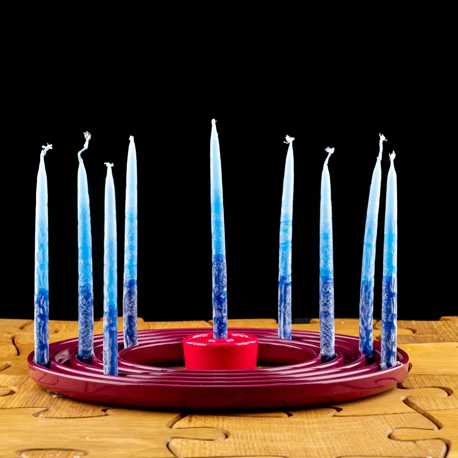 Plum Ripple Menorah By Tchotchke.jpg
