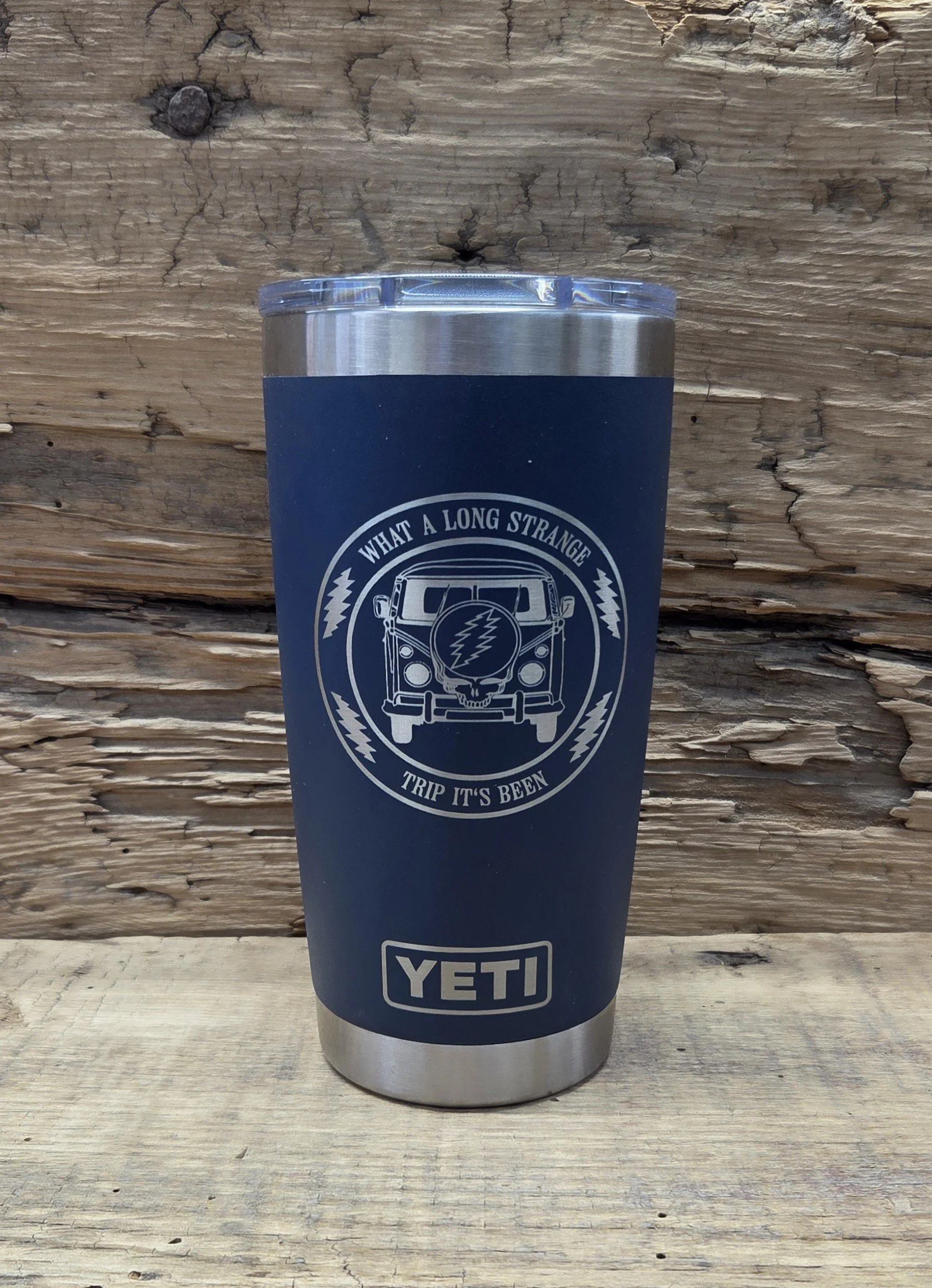 laser engraved 20oz navy blue YETI tumbler with Grateful Dead inspired "What a long strange trip it's been"