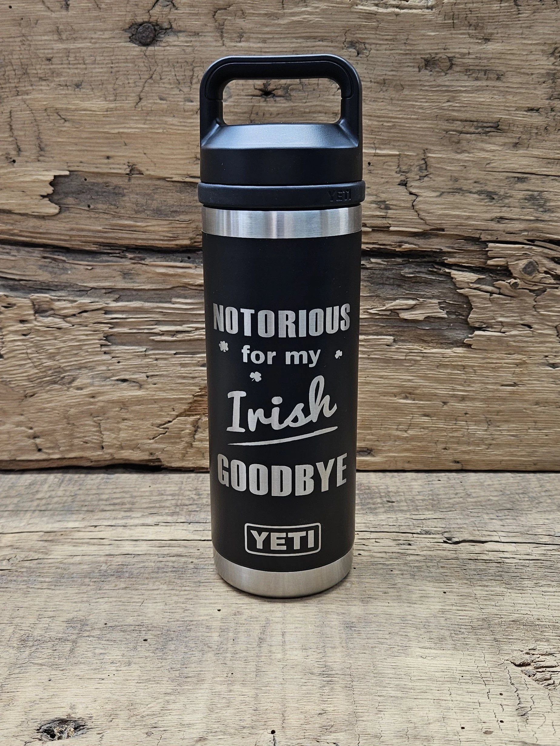 Custom laser engraved black stainless steel YETI water bottle with the phrase 'Notorious for my Irish Goodbye'