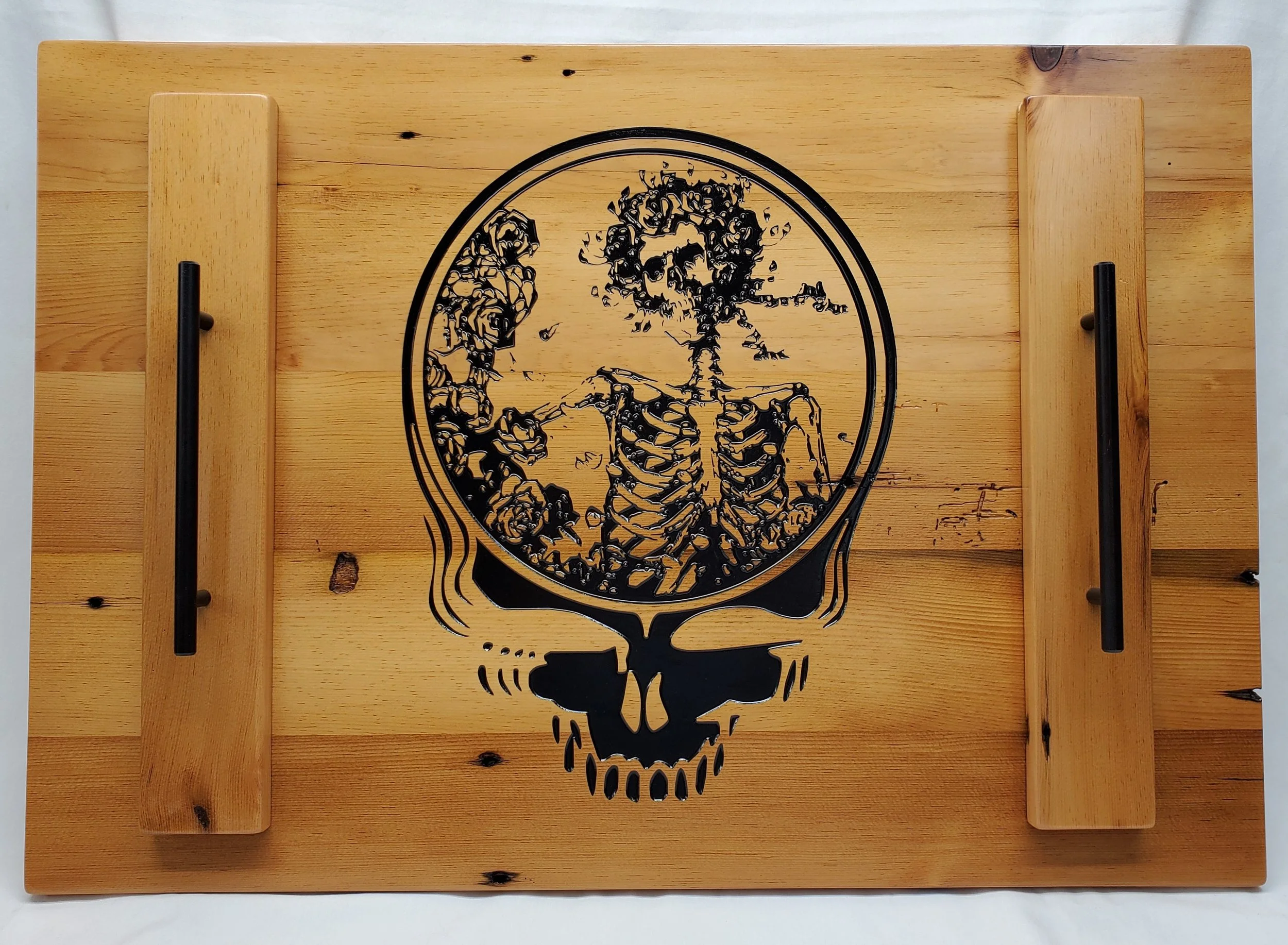 I made this stovetop cover from reclaimed barnboard a while back.  It's CNC engrave, painted, then finished to a nice shine! If you're interested in your own custom stovetop cover let me know. 