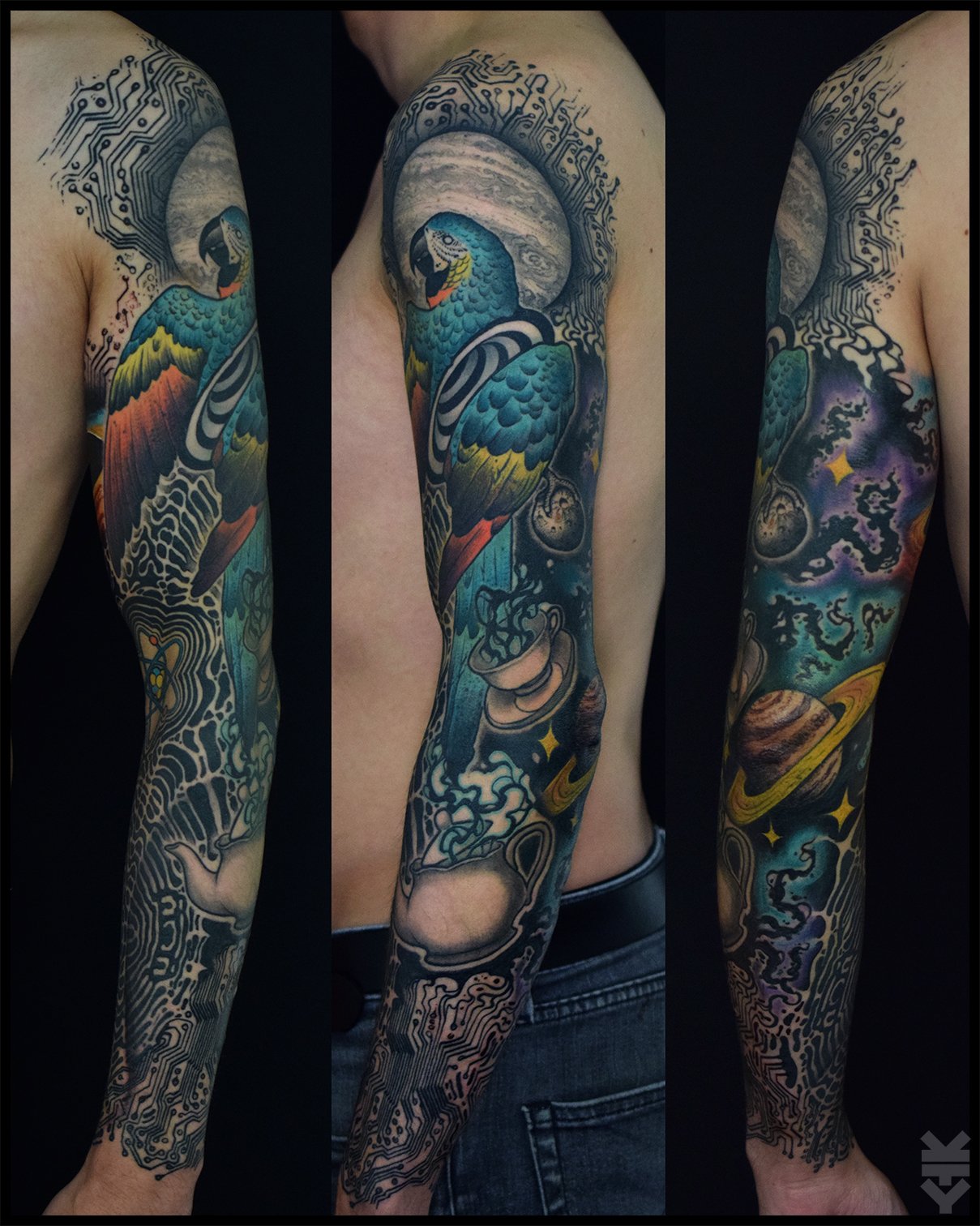 Tattoo sleeve featuring a colorful parrot, space elements like planets and stars, and abstract patterns with circuit-like lines.