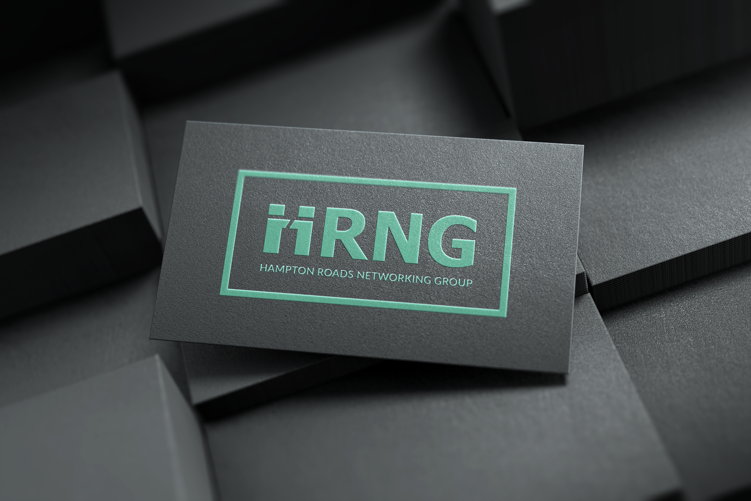 A business card for Hampton Roads Networking Group (HRNG) with a black textured background and teal text.