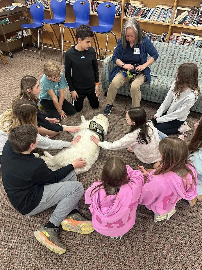 Our CCC team loved connecting with the students at Independence Middle School for Mental Health Day! They offered some much-needed furry stress relief while explaining the 'paws-on' work our dogs do to support mental health every day.