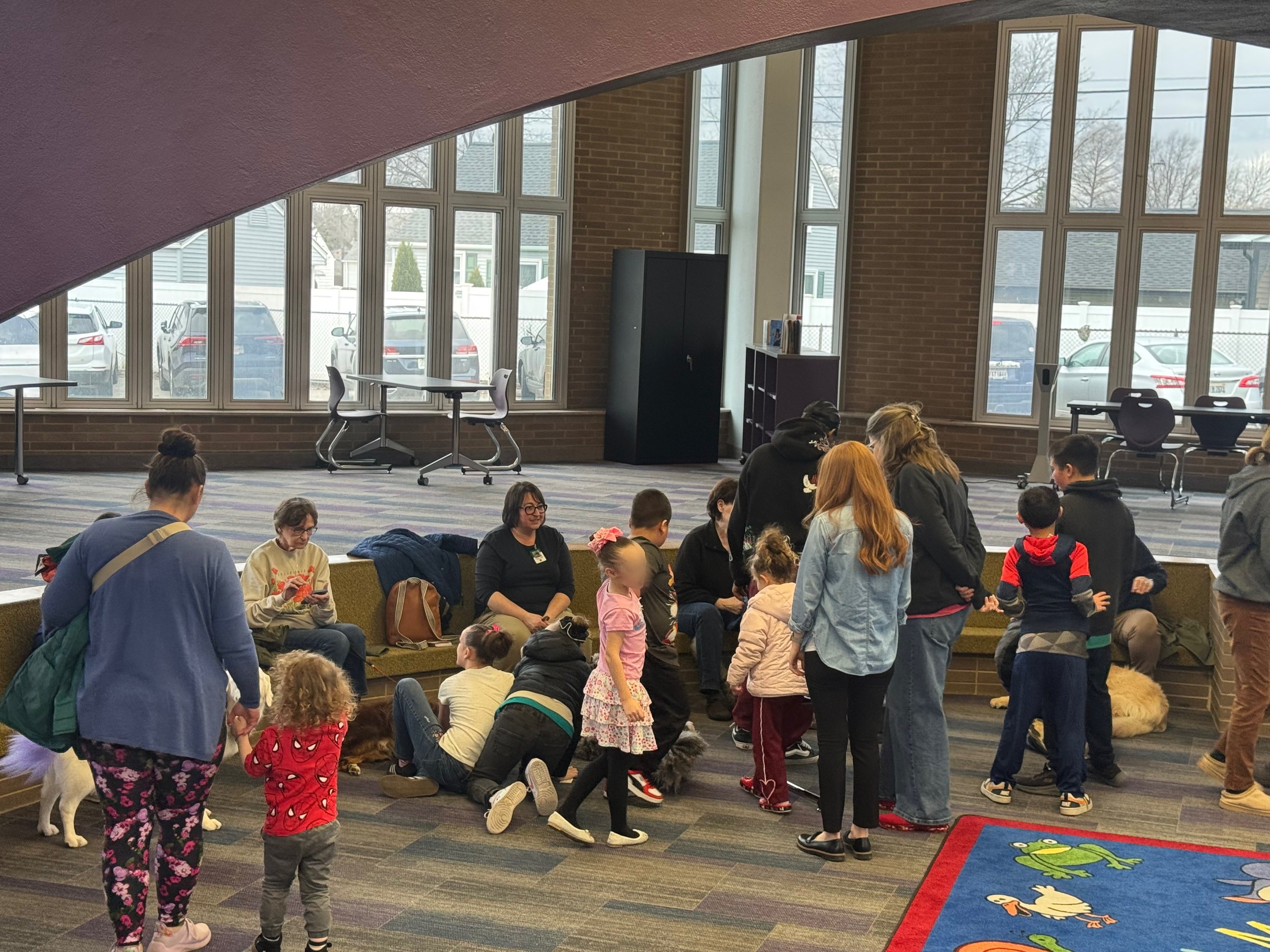 Let's "Paws" and Read Together - Annual interactive family reading night as 'One Book, One School' celebration kicks off in honor of a beloved teacher who shares her love of reading and dogs with the school.