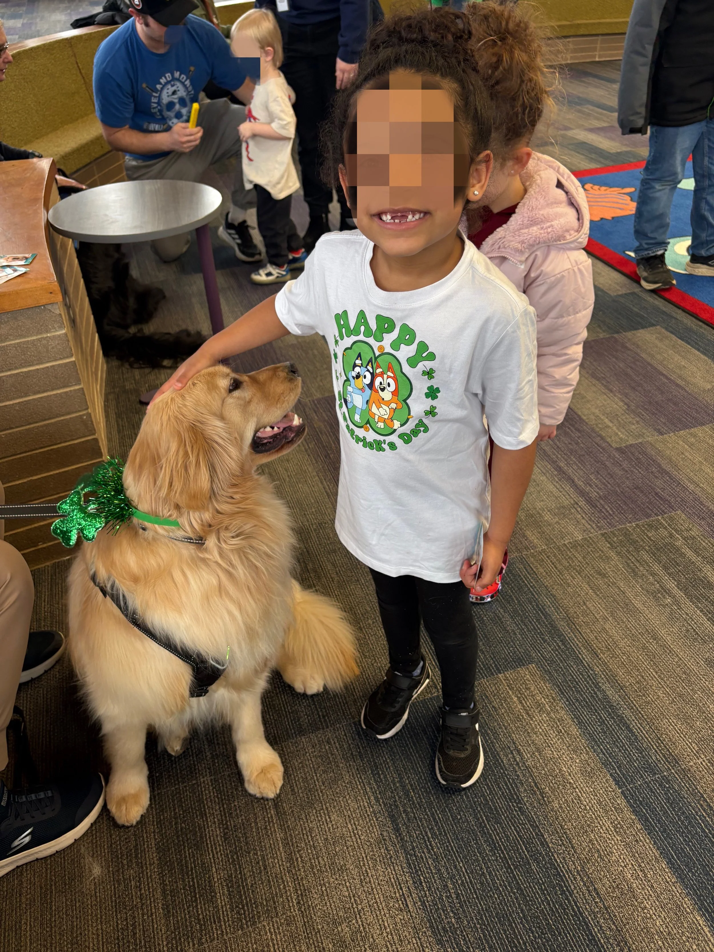 Let's "Paws" and Read Together - Annual interactive family reading night as 'One Book, One School' celebration kicks off in honor of a beloved teacher who shares her love of reading and dogs with the school.