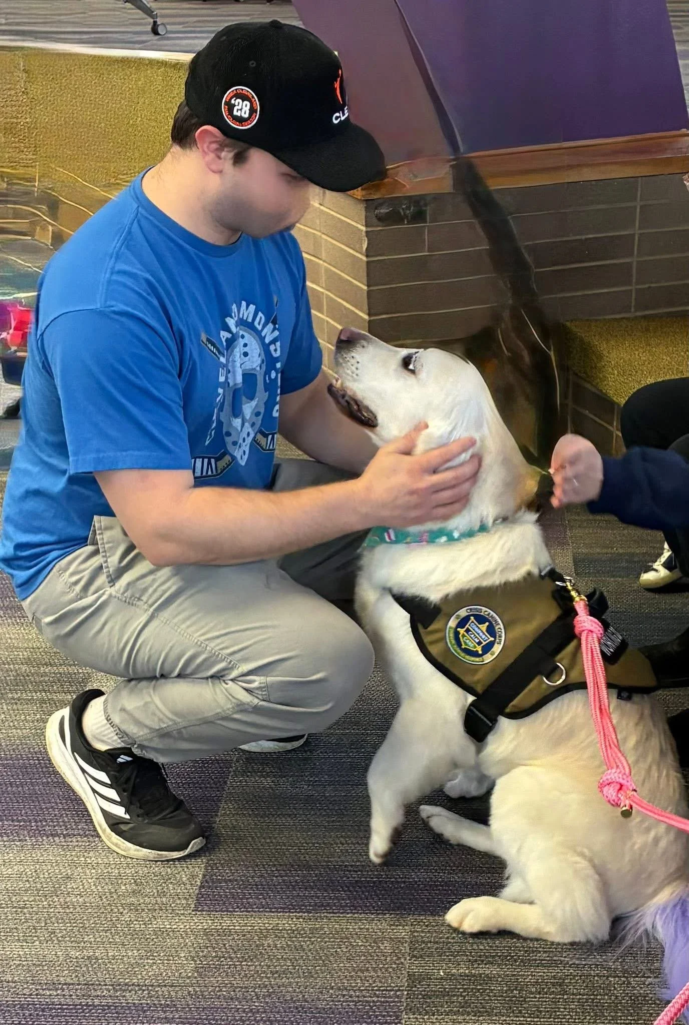 Let's "Paws" and Read Together - Annual interactive family reading night as 'One Book, One School' celebration kicks off in honor of a beloved teacher who shares her love of reading and dogs with the school.