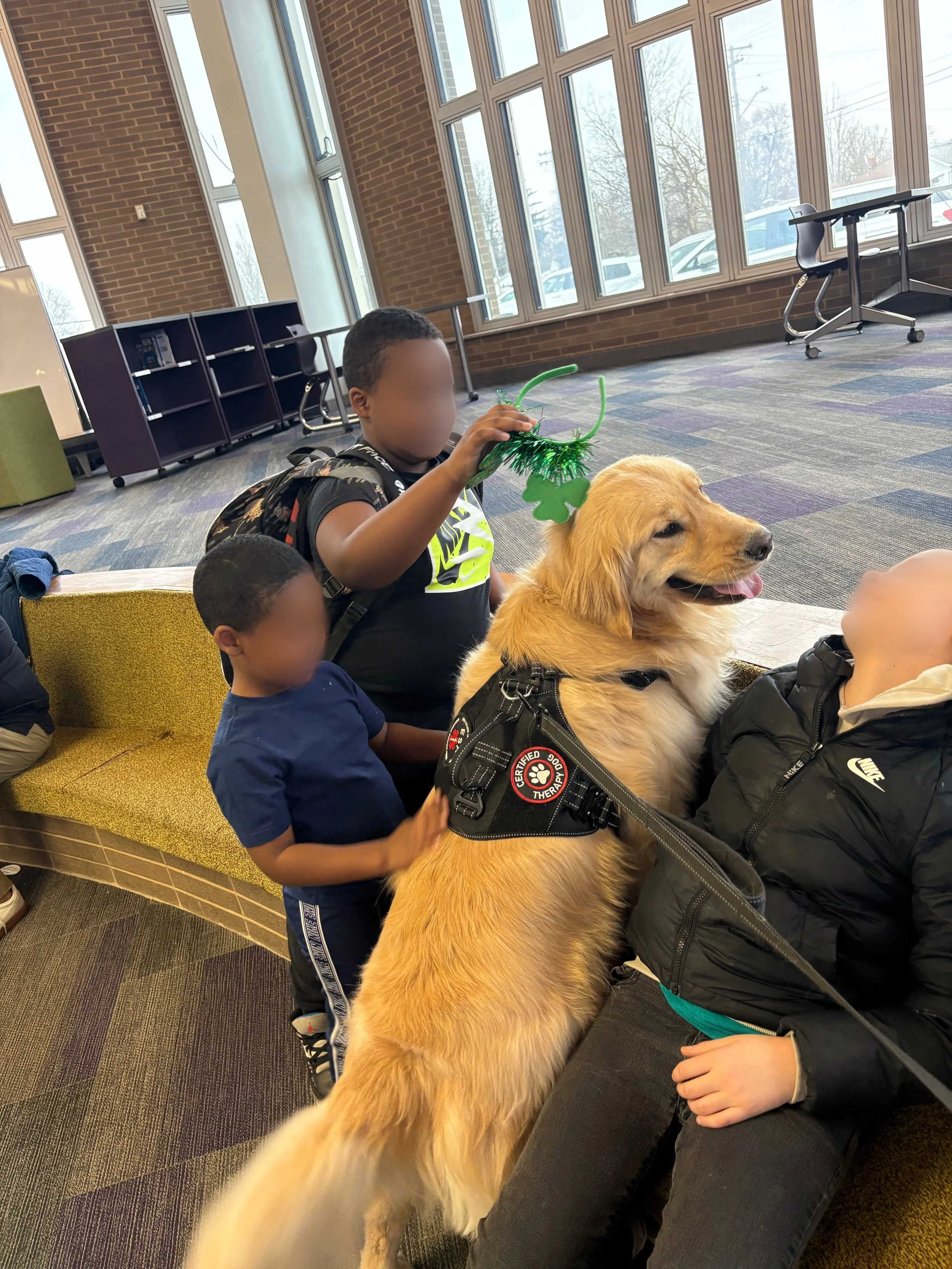 Let's "Paws" and Read Together - Annual interactive family reading night as 'One Book, One School' celebration kicks off in honor of a beloved teacher who shares her love of reading and dogs with the school.