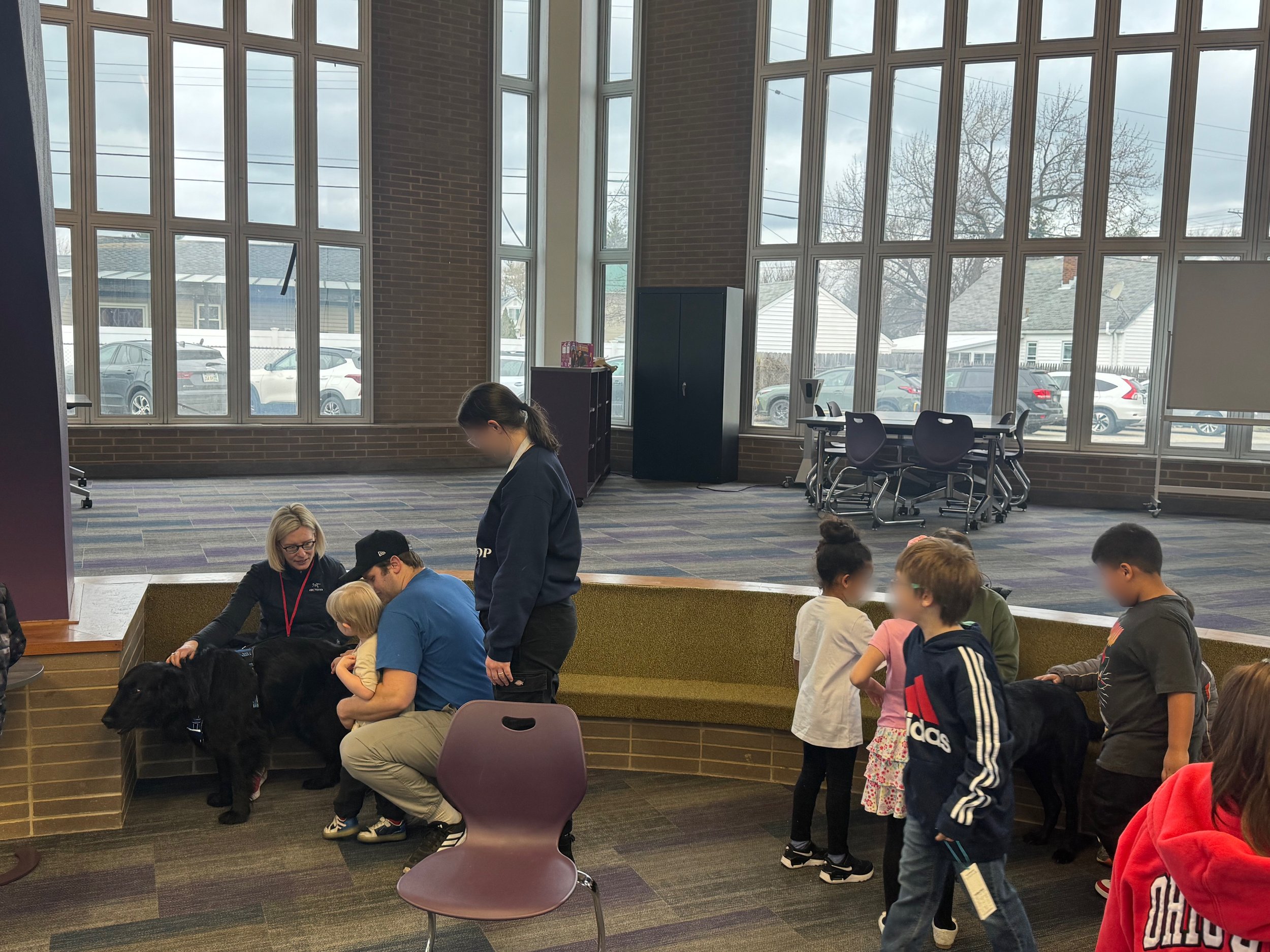 Let's "Paws" and Read Together - Annual interactive family reading night as 'One Book, One School' celebration kicks off in honor of a beloved teacher who shares her love of reading and dogs with the school.