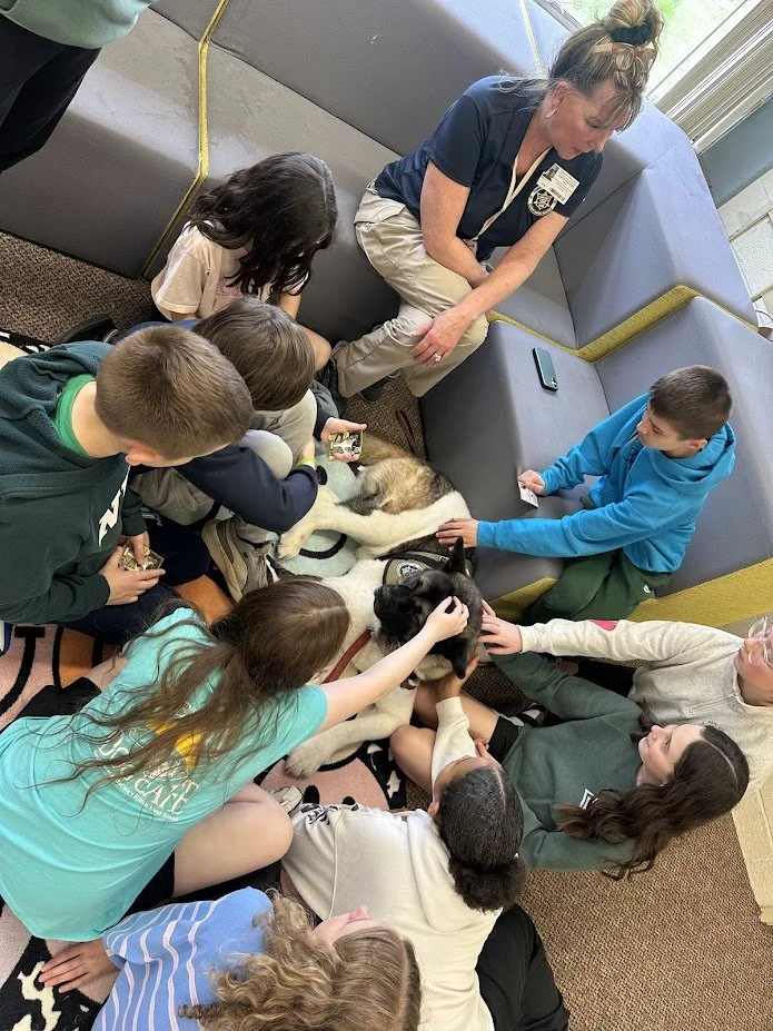 Our CCC team loved connecting with the students at Independence Middle School for Mental Health Day! They offered some much-needed furry stress relief while explaining the 'paws-on' work our dogs do to support mental health every day.
