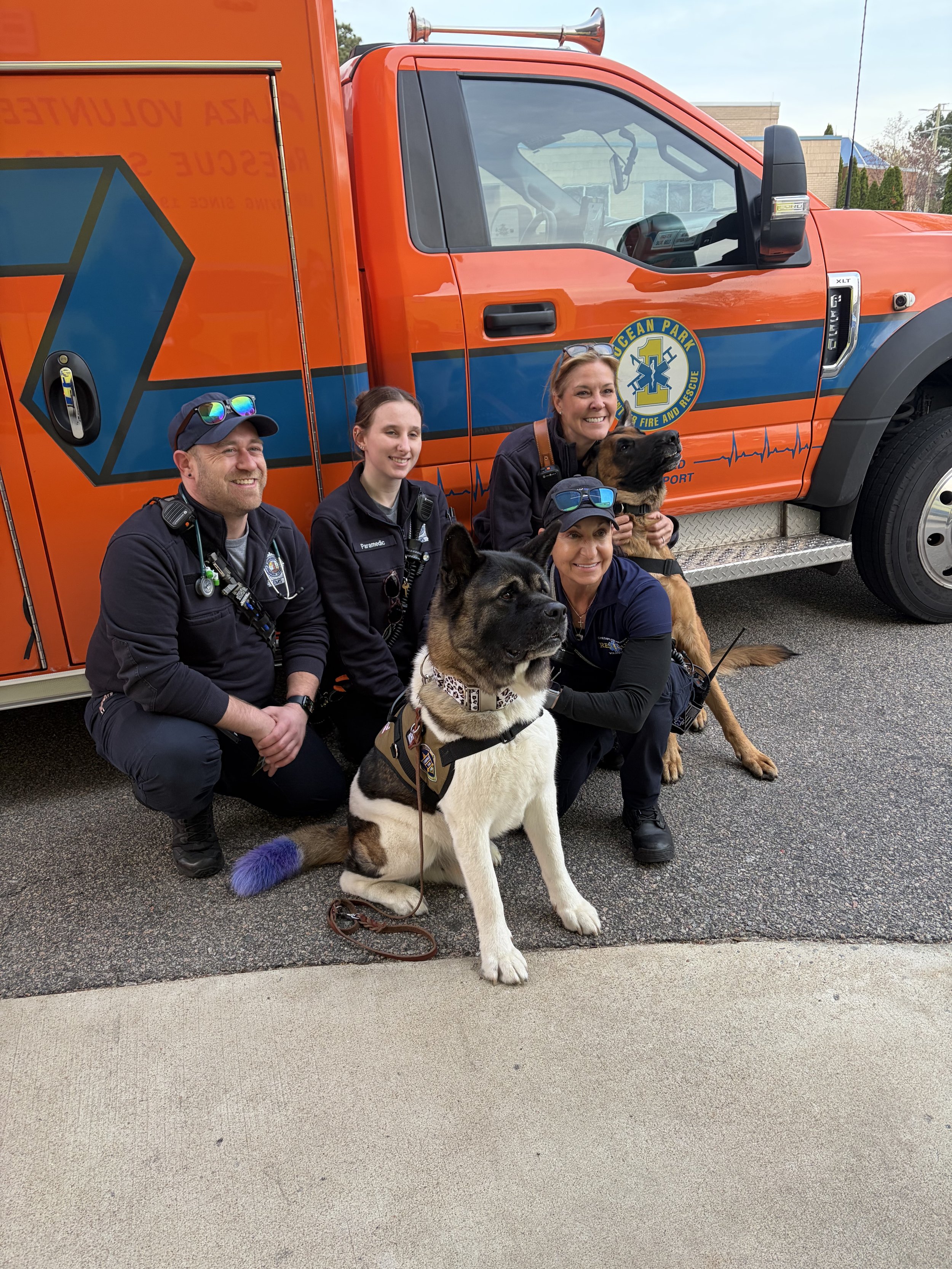 Zodiac & Apollo visiting local EMS crews while they were working to provide comfort, calm, and care.