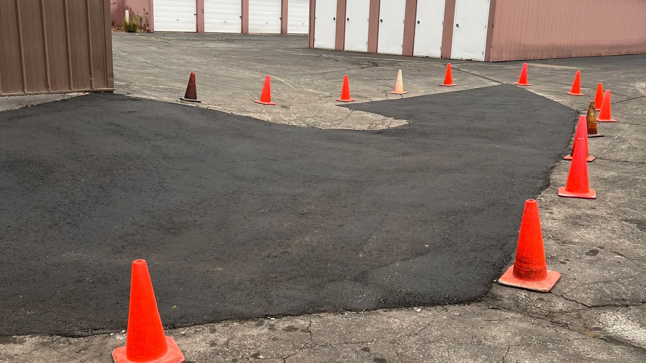 Asphalt patch repair in commercial parking lot in Green Bay Wisconsin
