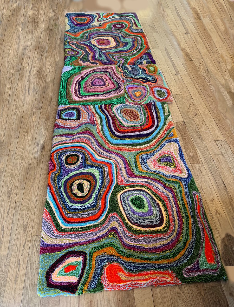 "Long circles rug" Polyester yarn, rug backing, glue 14'x4'