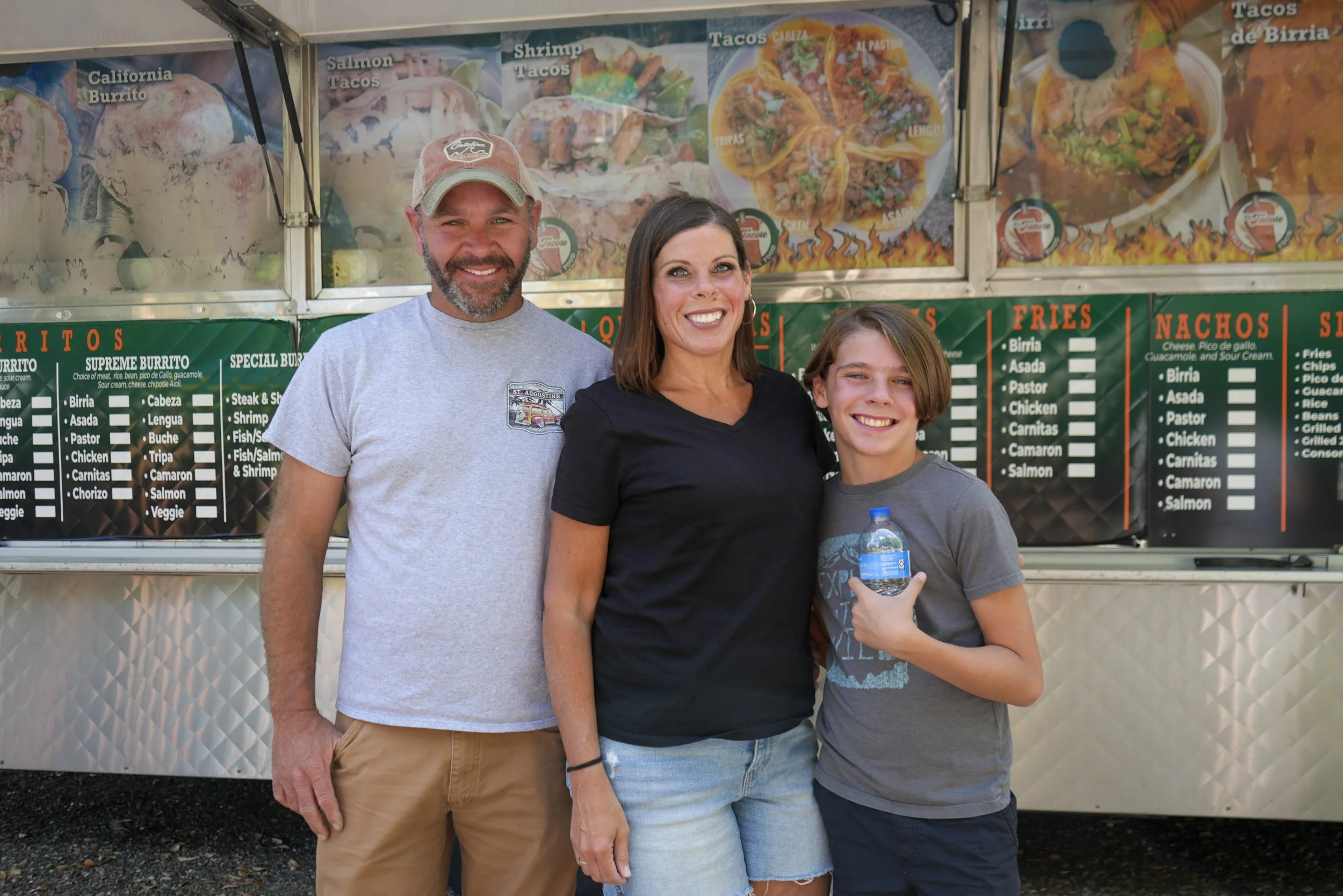 family at walnut rv park in front of food truck
