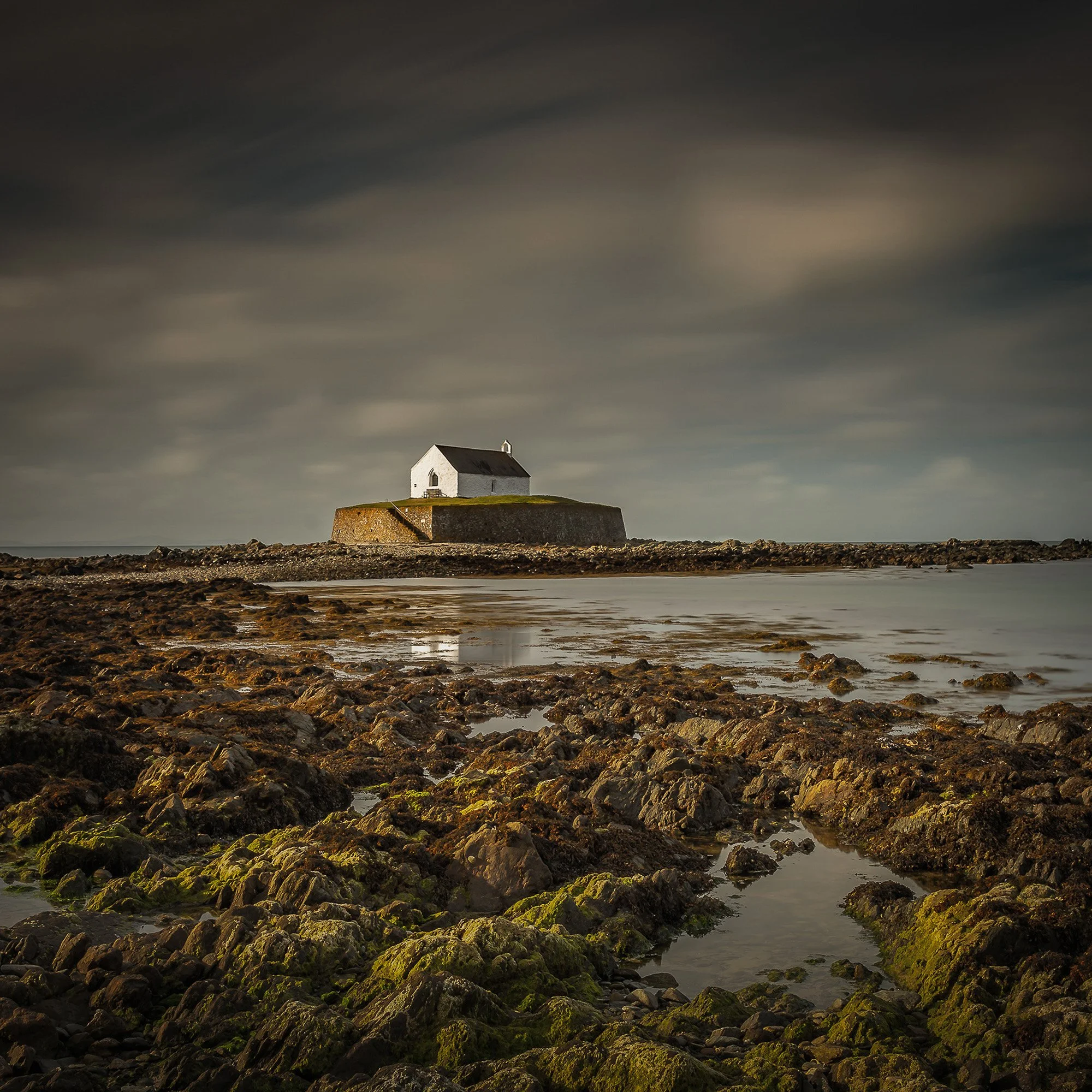 "The Quiet Outpost". St Cwyfan's Church. Anglesey