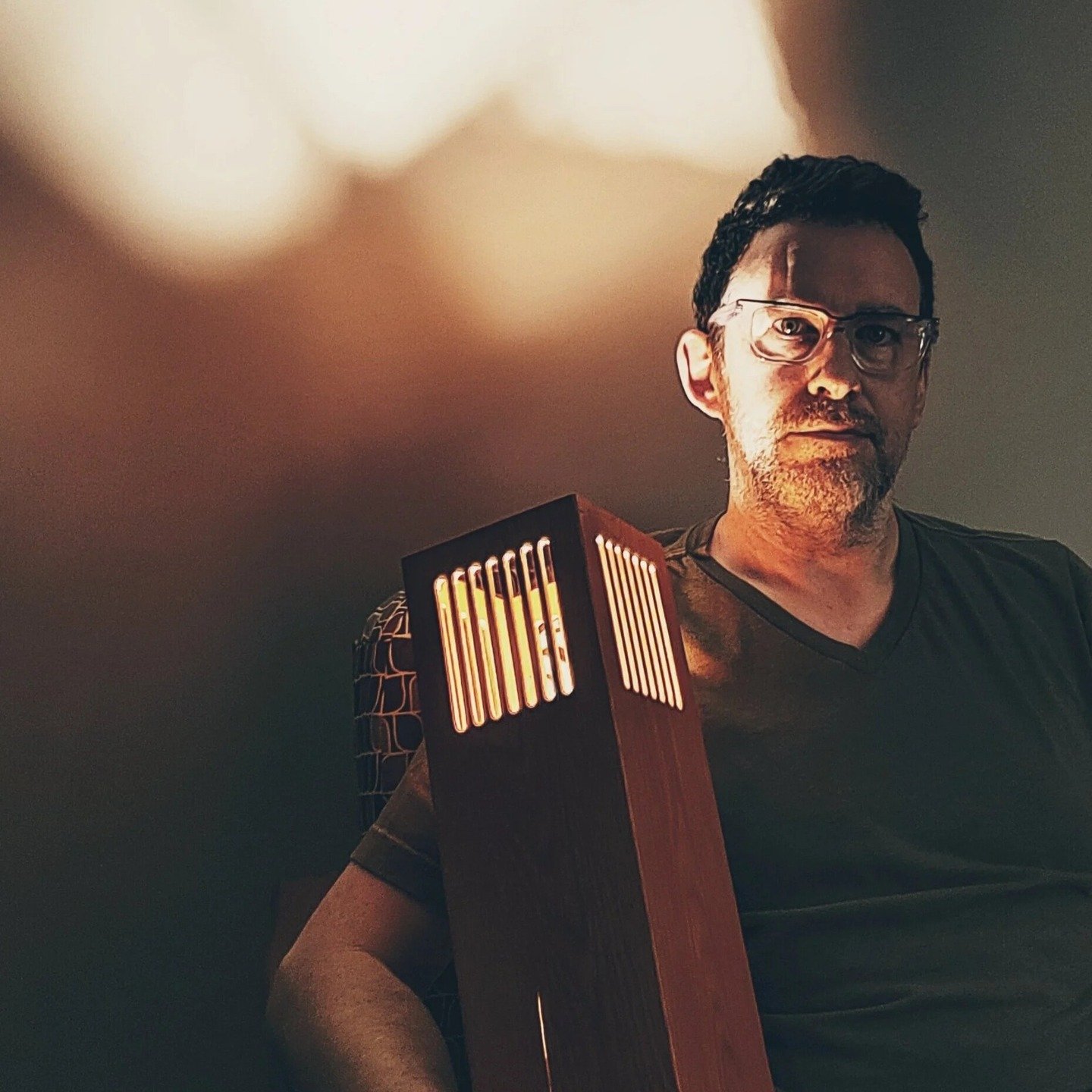 From swapping ceiling lights as a teen to launching his own studio, Mike Scribner&rsquo;s journey comes full circle. After a 25-year career in science, Mike returned to design with a focus on mindfulness, exploring how light, shadow, and natural wood