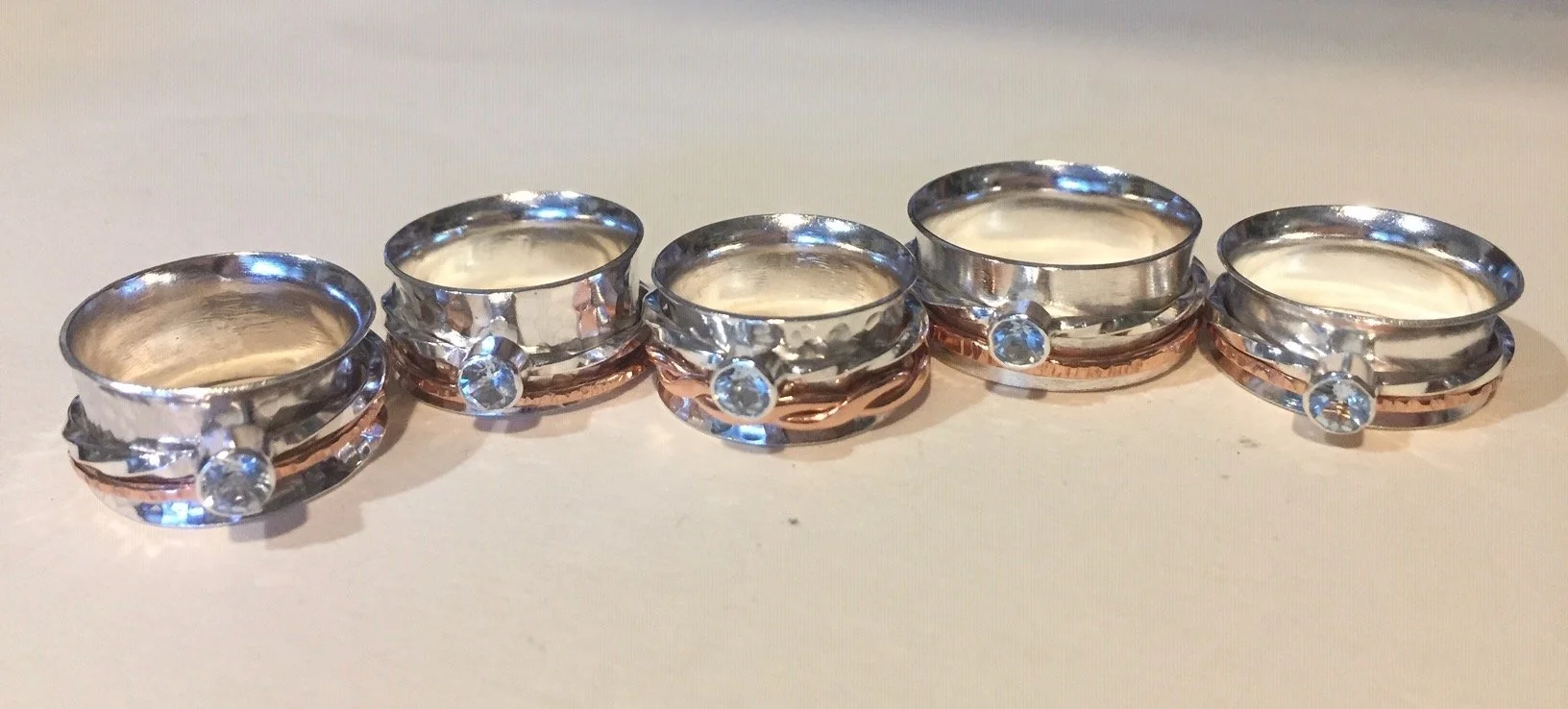 Five Daughters' Aquamarine Spinner Rings