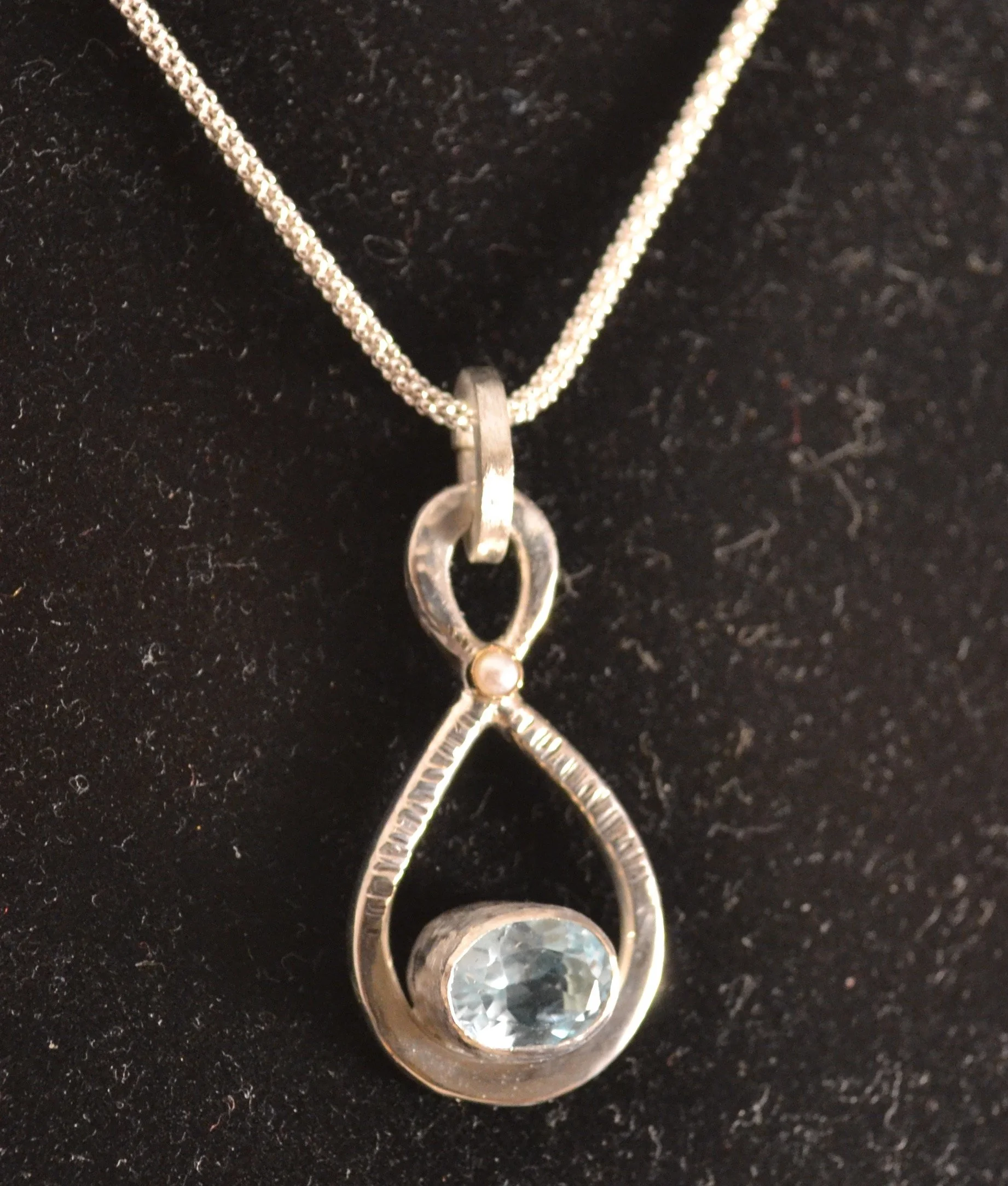 Infinity Pendant with Aquamarine