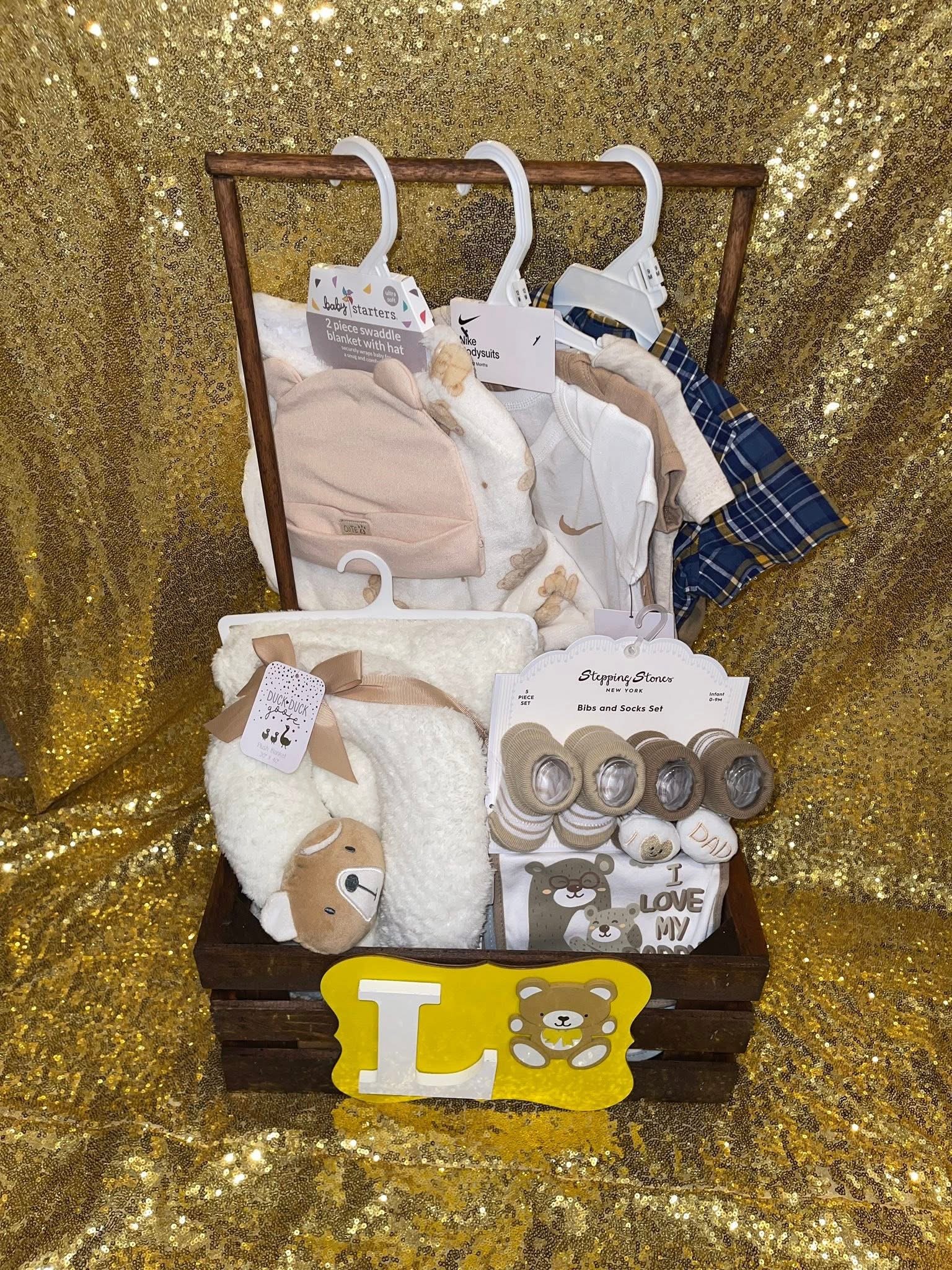 Front view of Littles Luxe Crate featuring baby clothes, shoes, accessories and yellow with bears theme