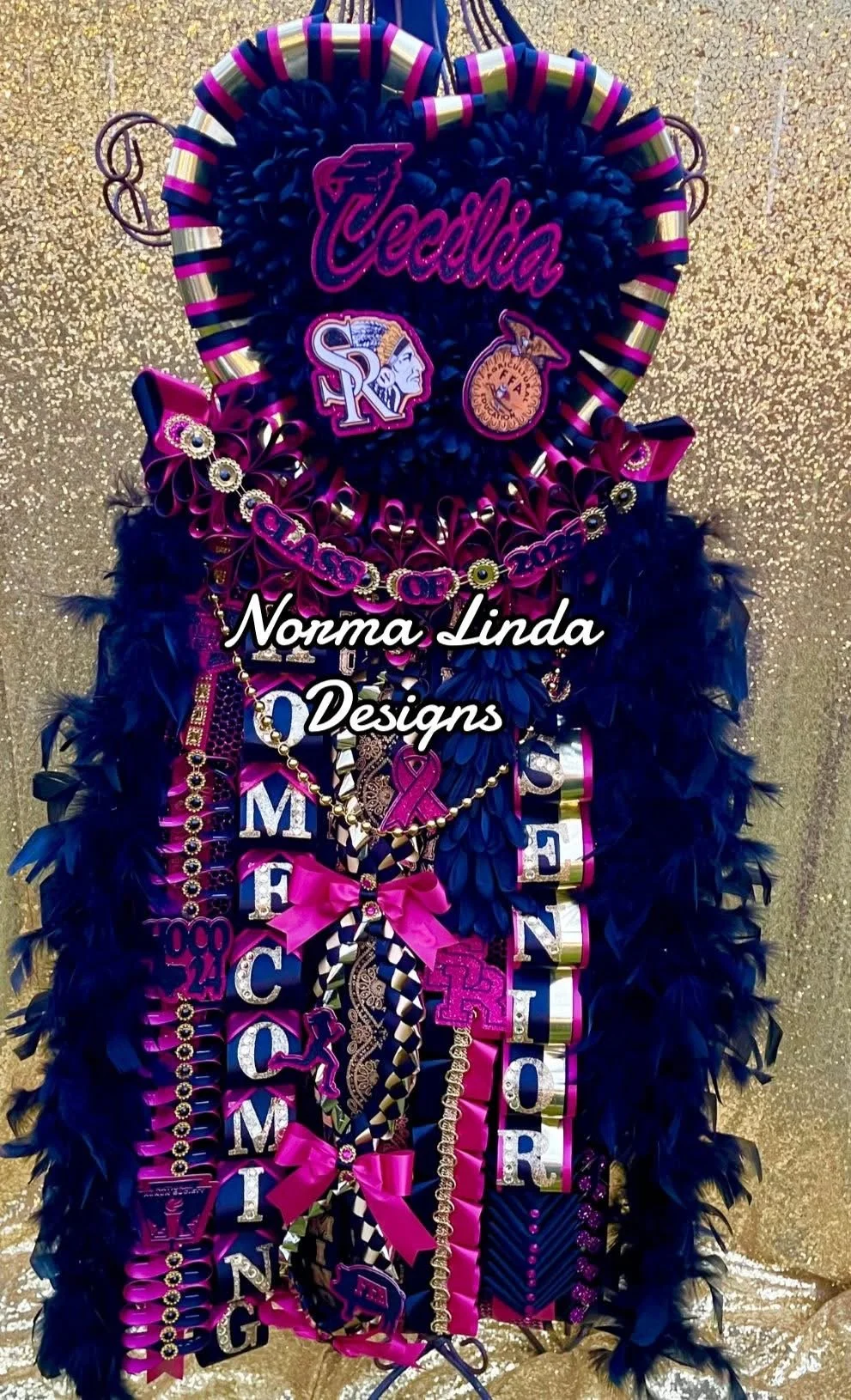 Heart shape mum in black and hot pink theme, featuring black satin ribbons, hot pink satin ribbons and client name