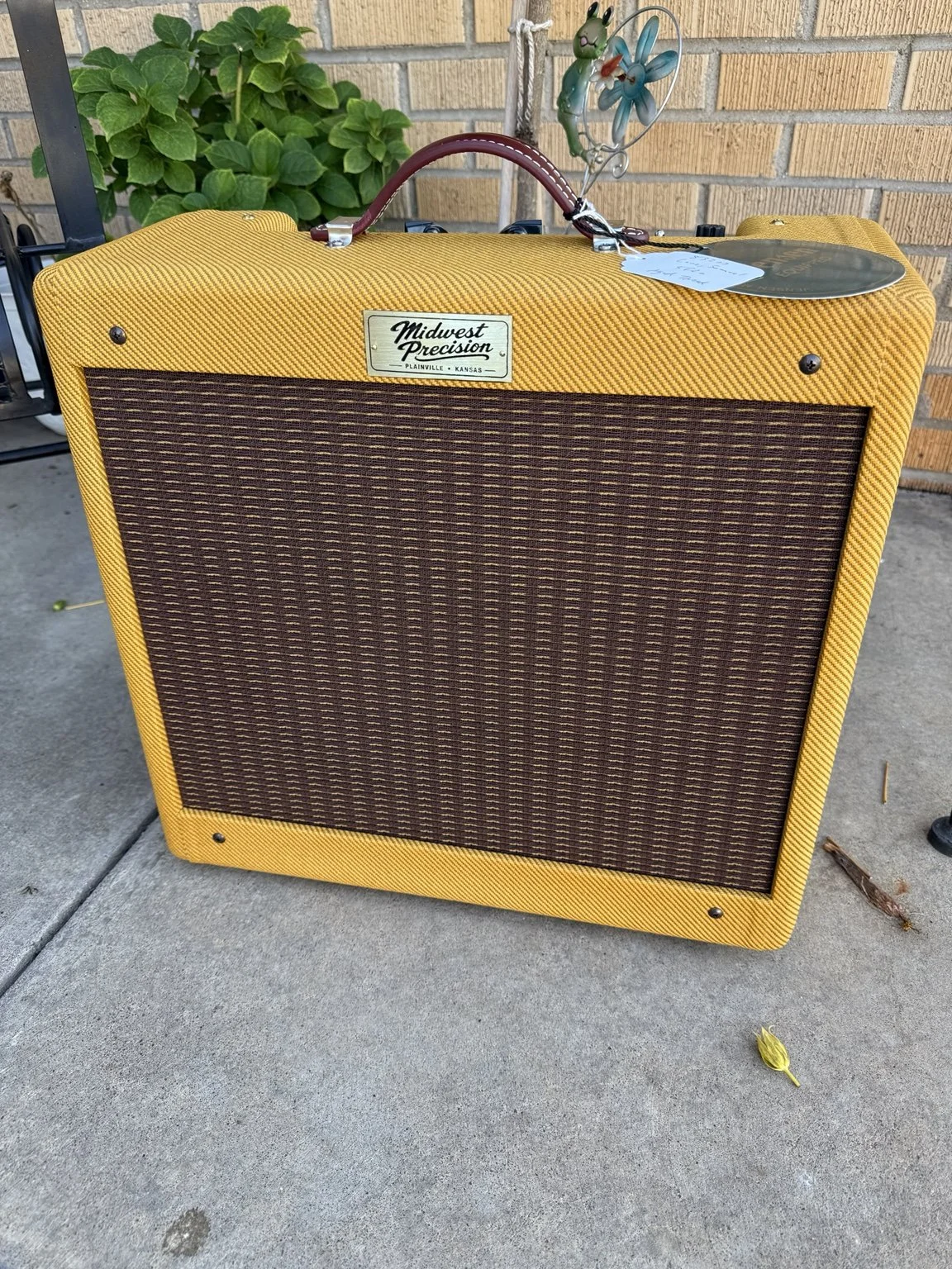 MP-001 The Contender, a hand-wired 5F2-A-derived amplifier in a yellow tweed-style cabinet with a 10-inch Jensen speaker.