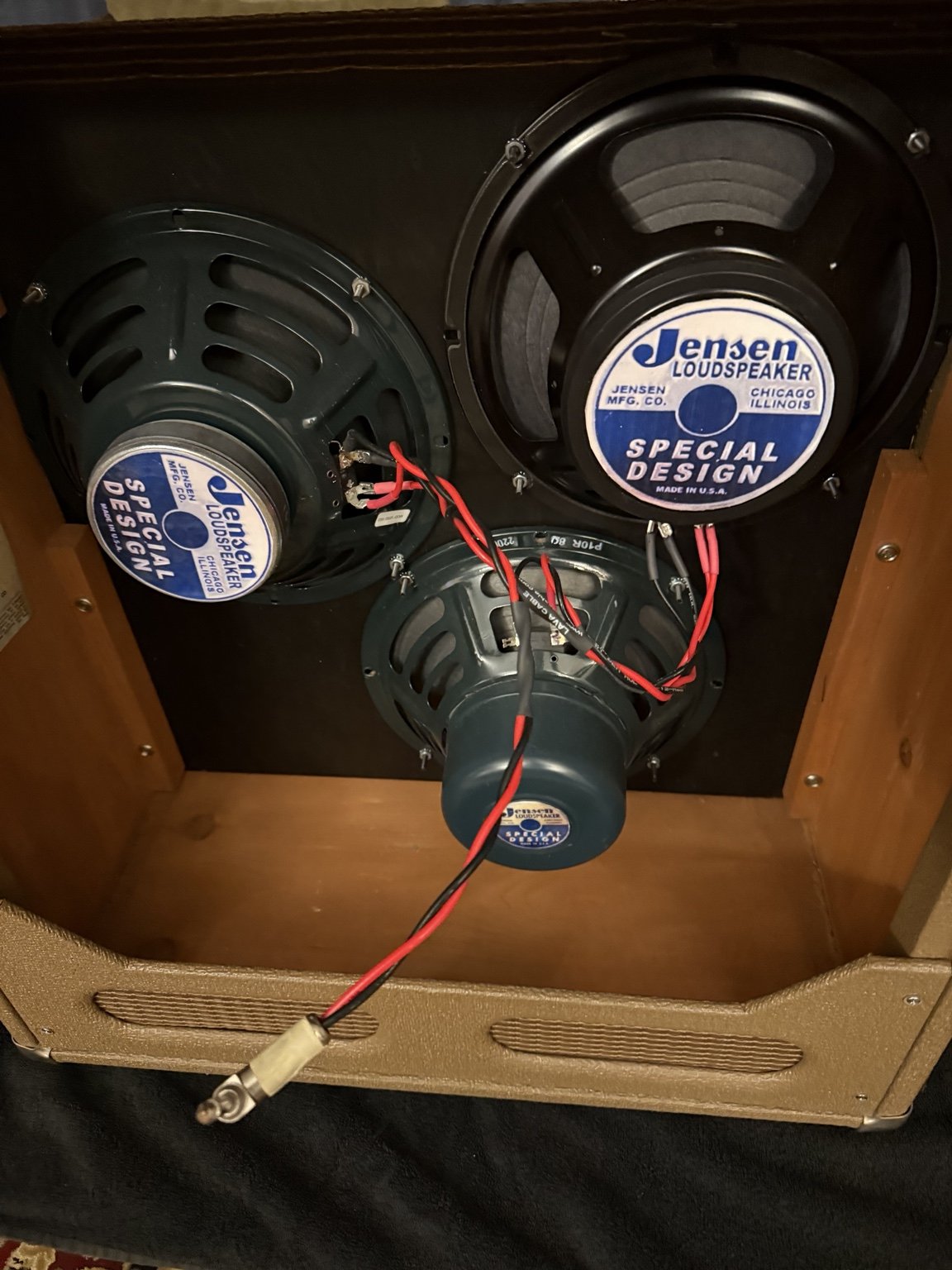 Three 10-inch speakers in the non-original cabinet of a 1964 Fender Bassman, photographed during impedance verification.