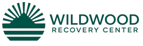 Logo of Wildwood Recovery Center with a stylized sunrise or sunset above horizontal lines resembling a landscape