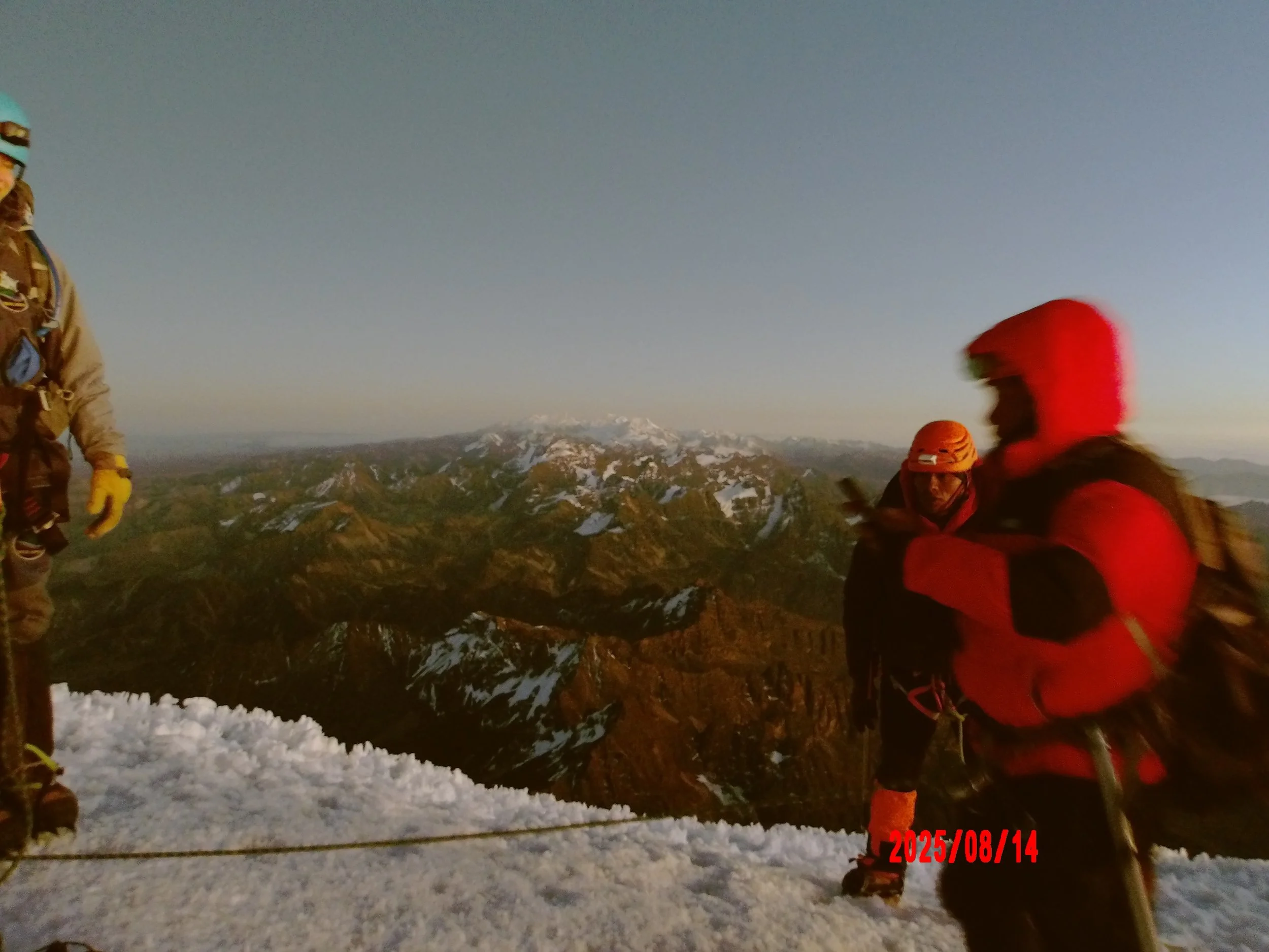 Personas en la cumbre de Huayna Potosí