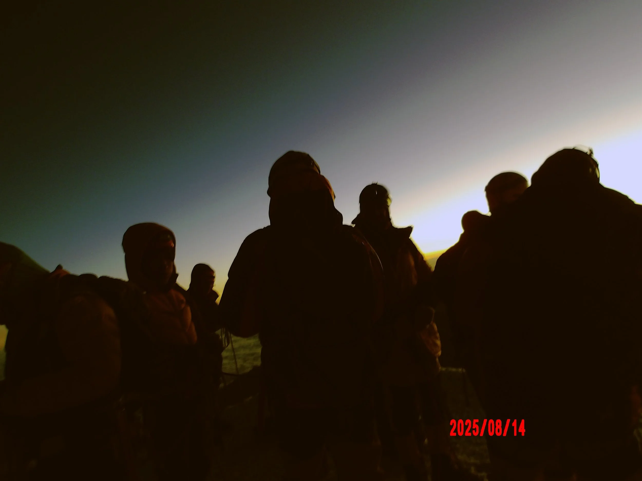 Personas en la cumbre de Huayna Potosí.