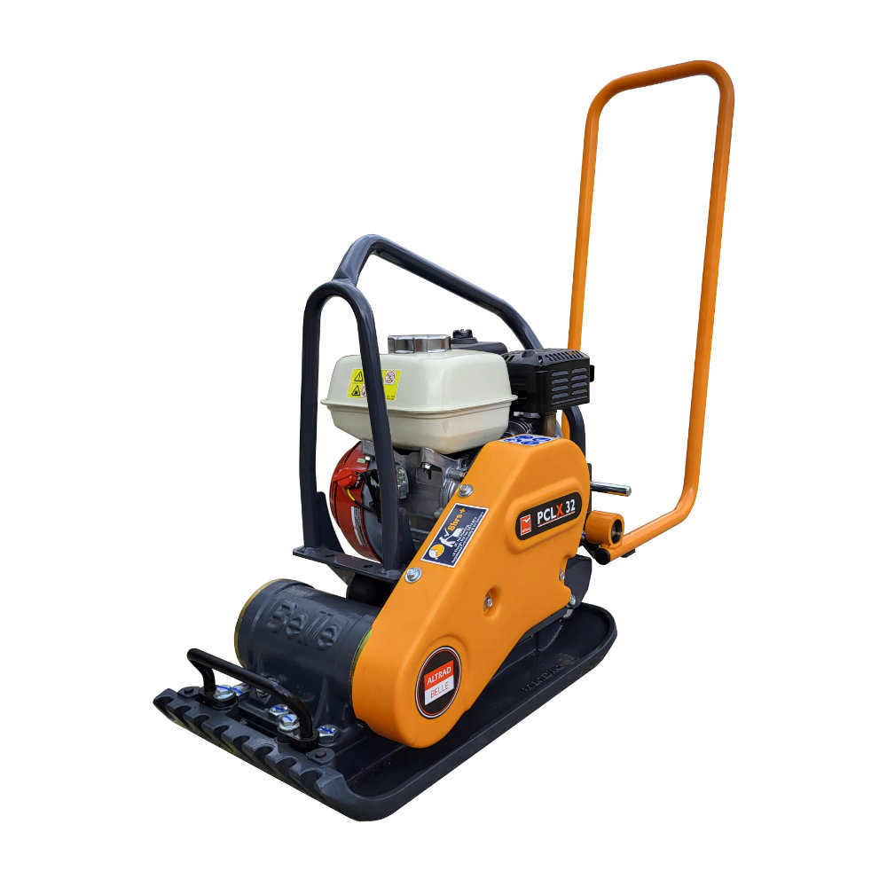 A black and orange plate compactor with a handle, engine, and base plate
