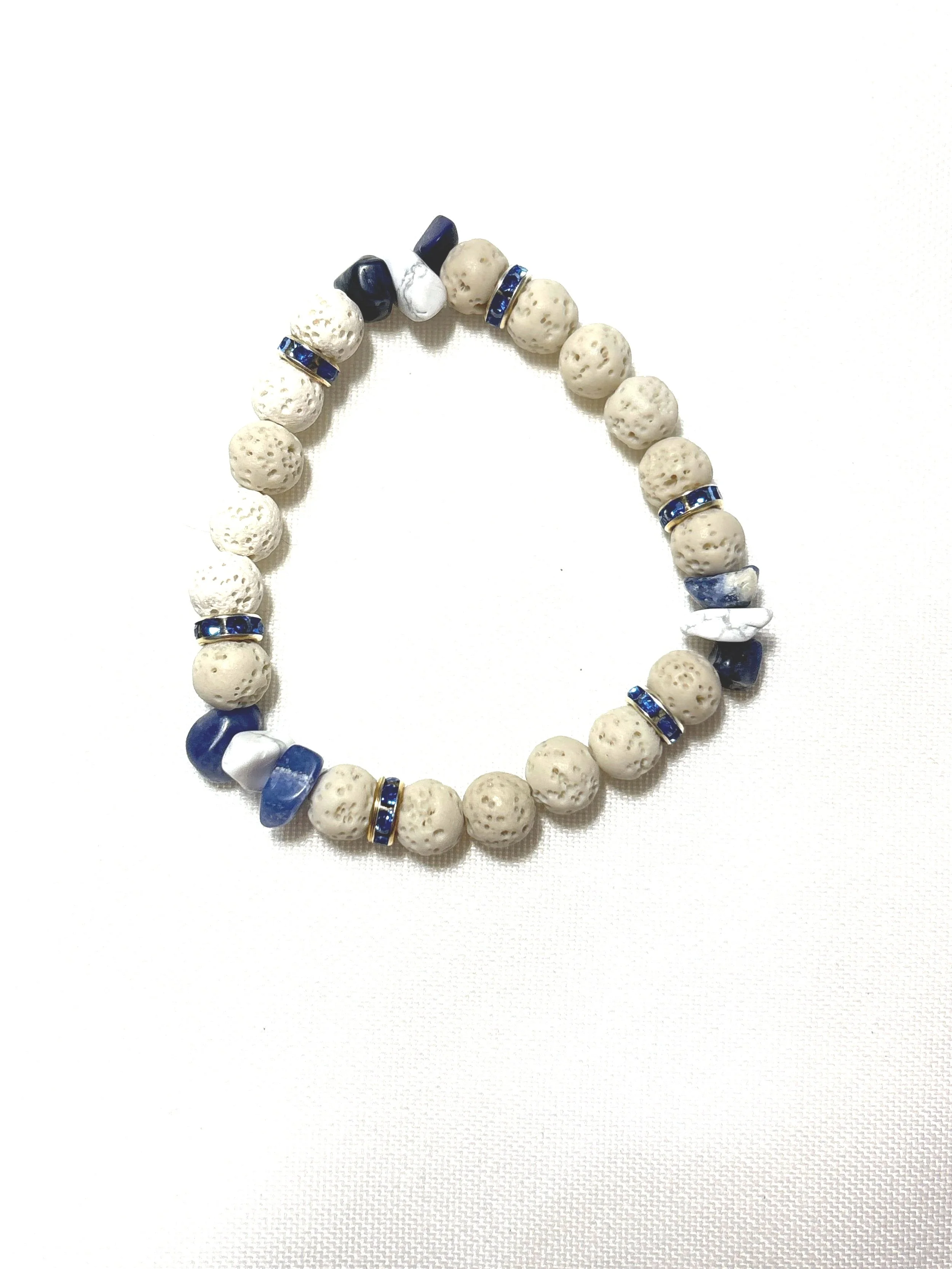 White lava stone with blue and white polished rocks