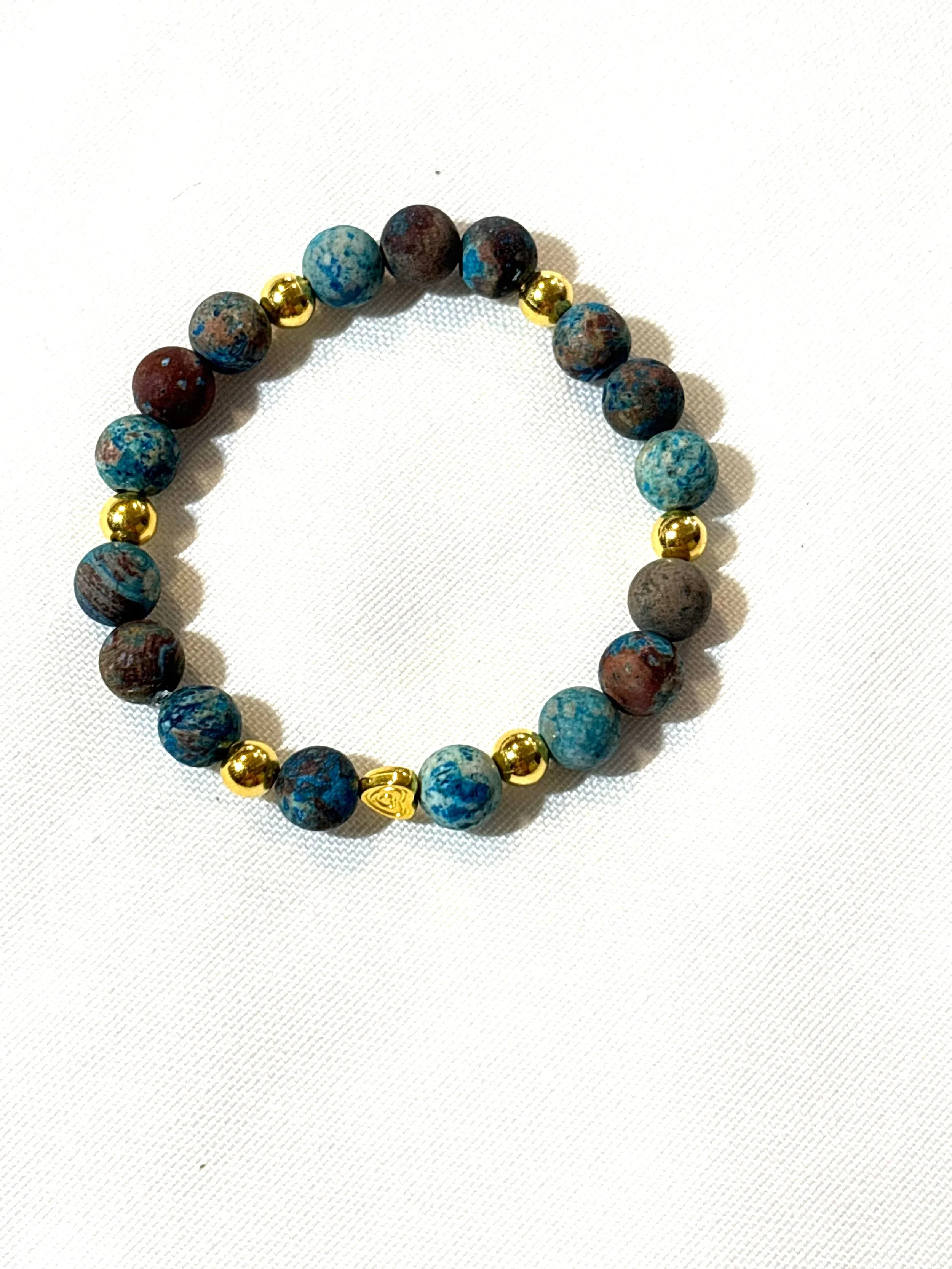 Stone bracelet with charms