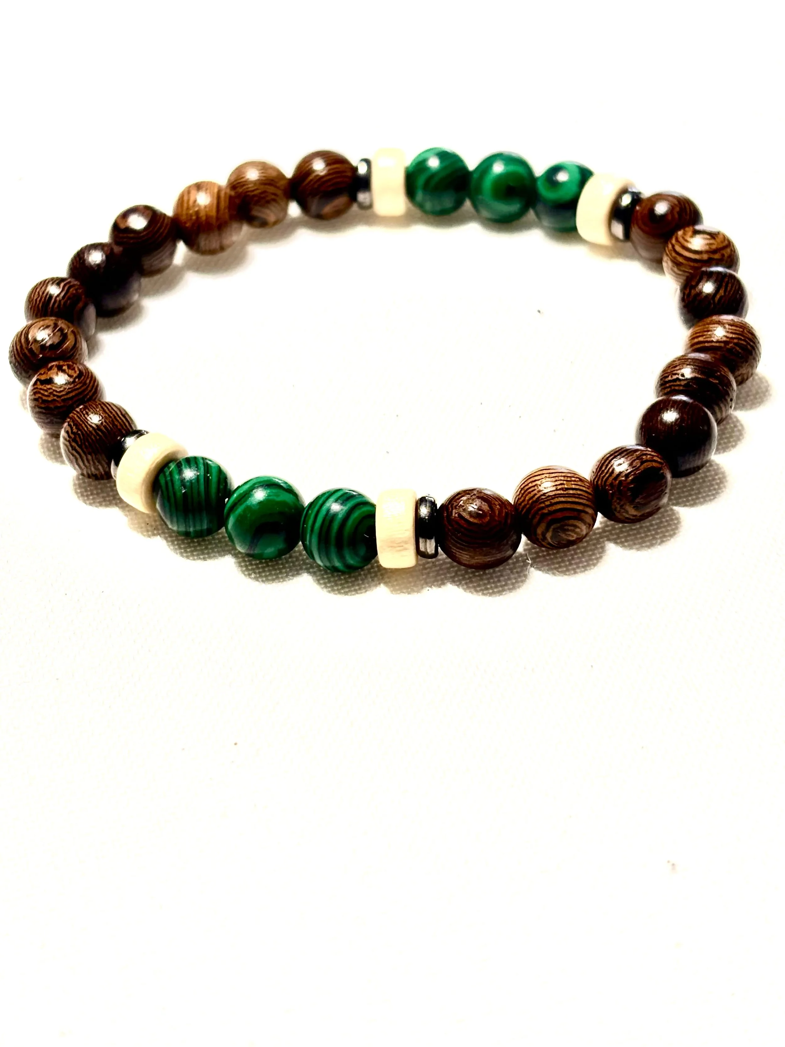 Dark wood beads with Malachite. 8mm