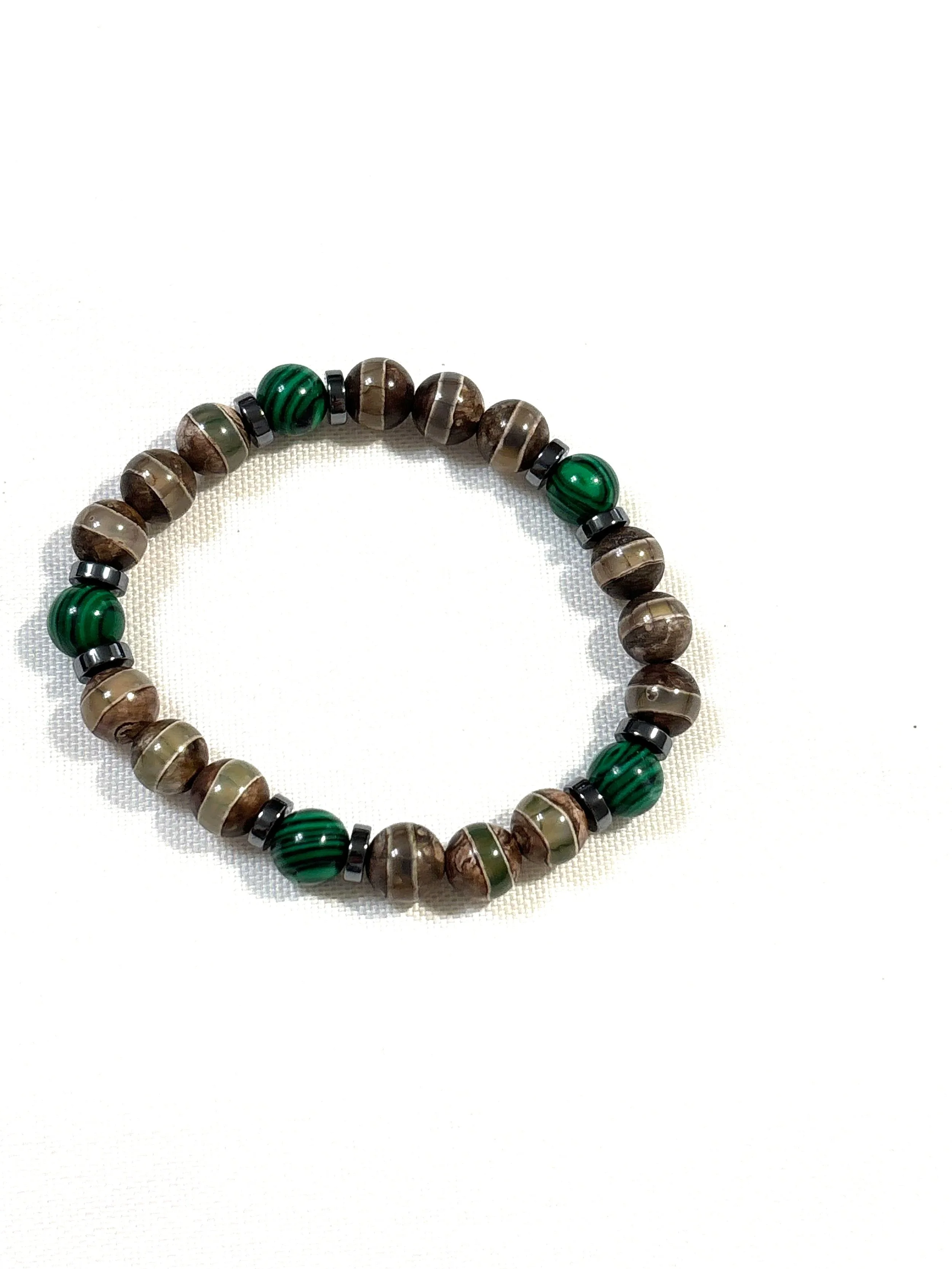 Wood stone with malachite and hematite